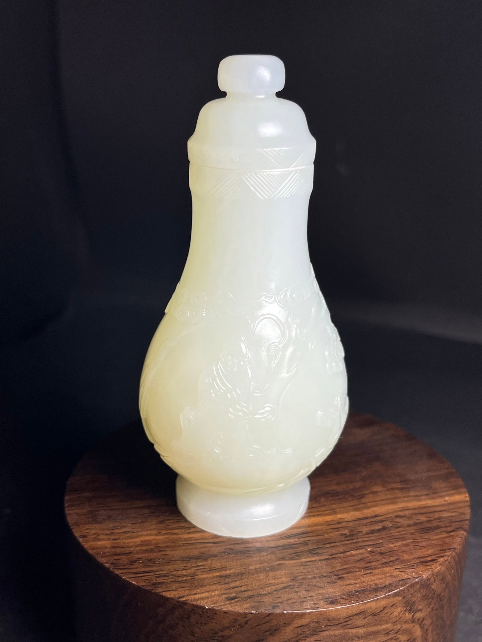 An Exquisite White Jade Landscape and Figure Pattern Bottle (1 of 7)