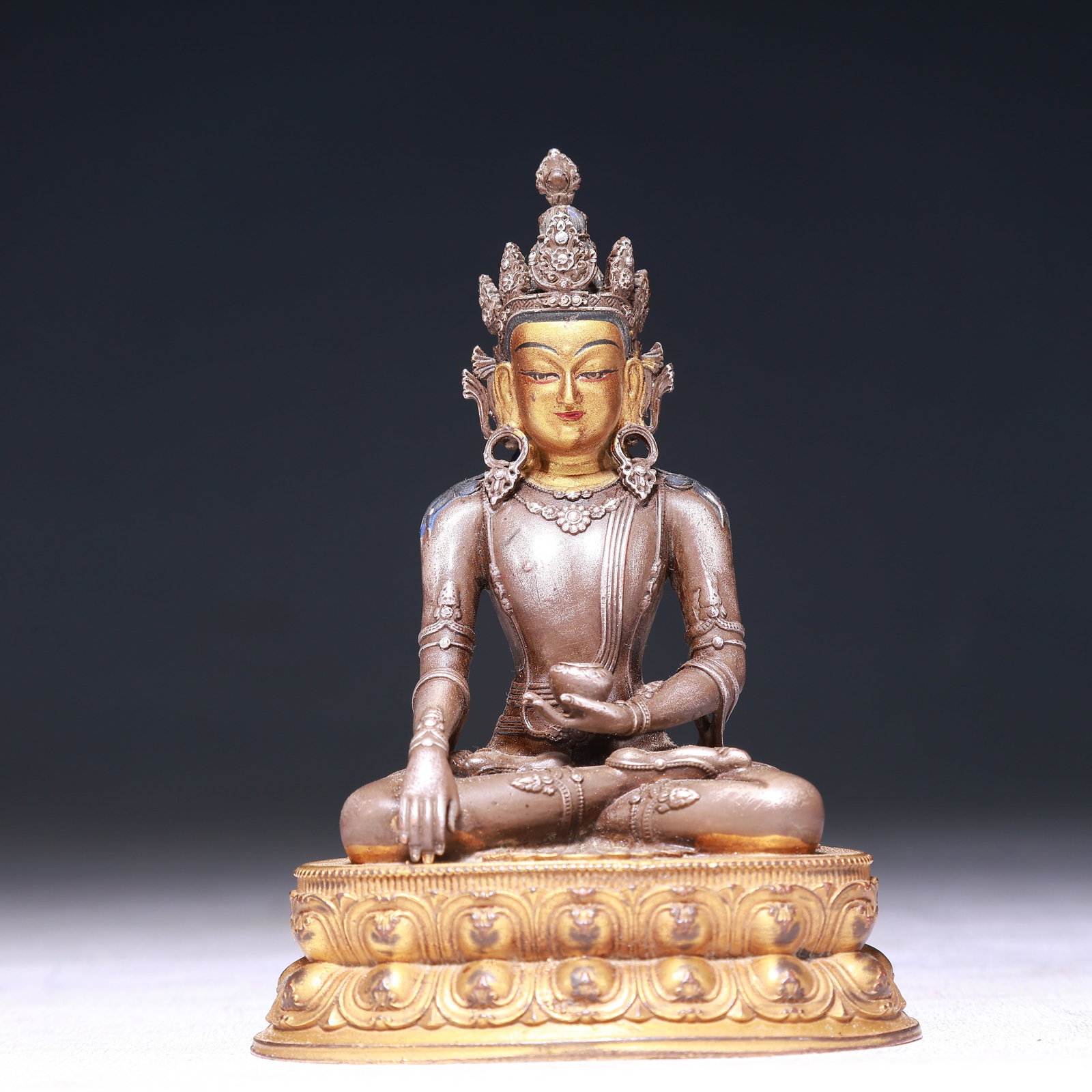 A Solemn Gilt Silver Statue of Amitayus: A Solemn Gilt Silver Statue of Amitayus,Qing Dynasty,China,Size:3inx2.2inx4.1in,Weight:300g 纯银鎏金无量寿佛像,中国清代