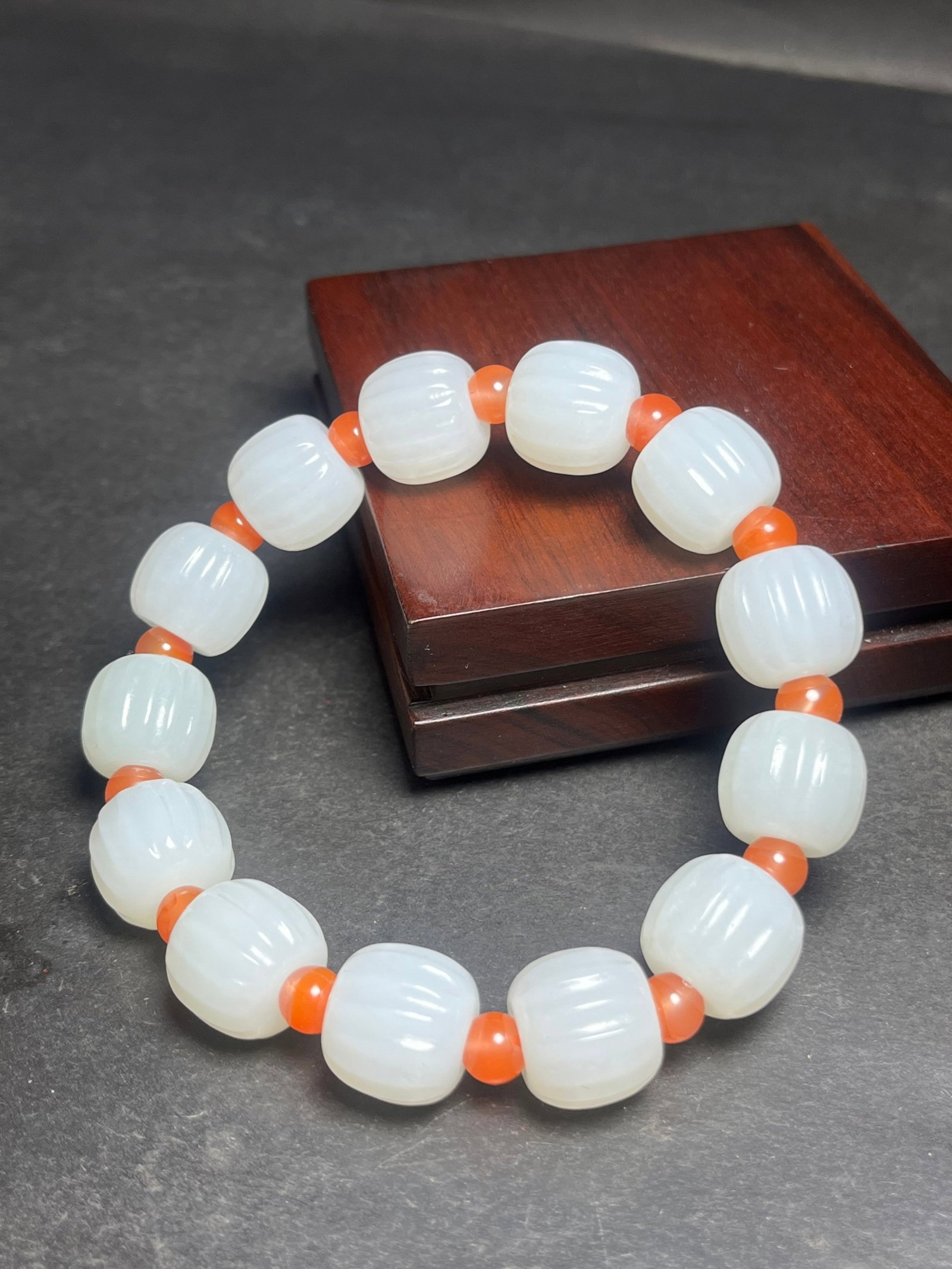 An Exquisite White Jade Pumpkin Bracelets: An Exquisite White Jade Pumpkin Bracelets,Qing Dynasty,China,Size:15mm,Weight:74g 白玉南瓜手串,中国清代