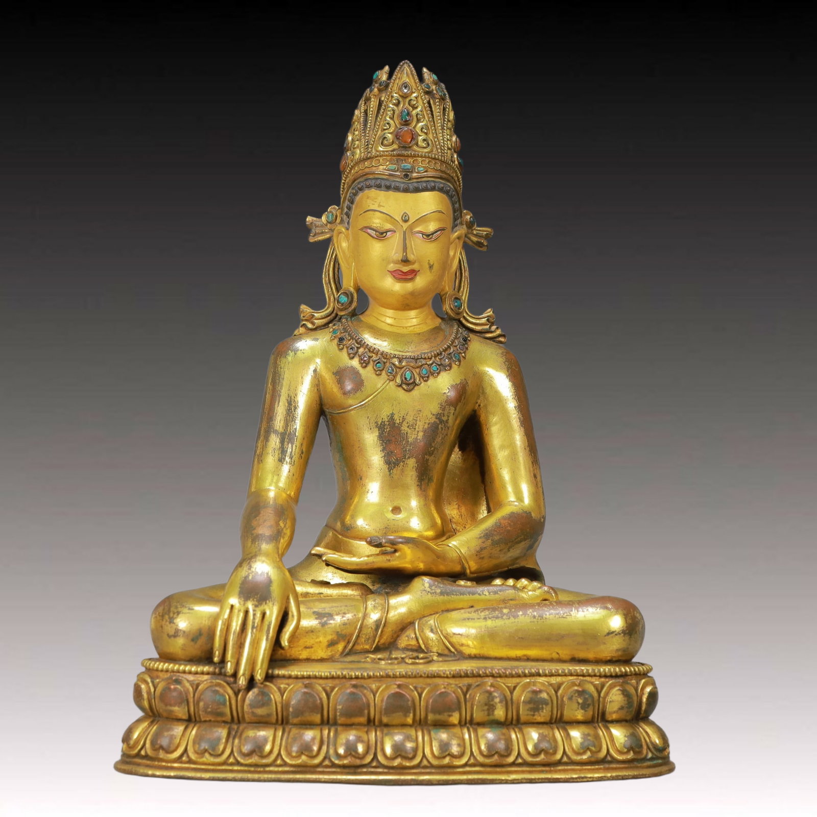 A Solemn Gilt Bronze Statue of Sakyamuni,Inlaid Gems,With Inscription: A Solemn Gilt Bronze Statue of Sakyamuni,Inlaid Gems,With Inscription,Ming Dynasty, China,Size:10.8inx7.1inx15in,Weight:7500g 铜鎏金释迦摩尼像,嵌&