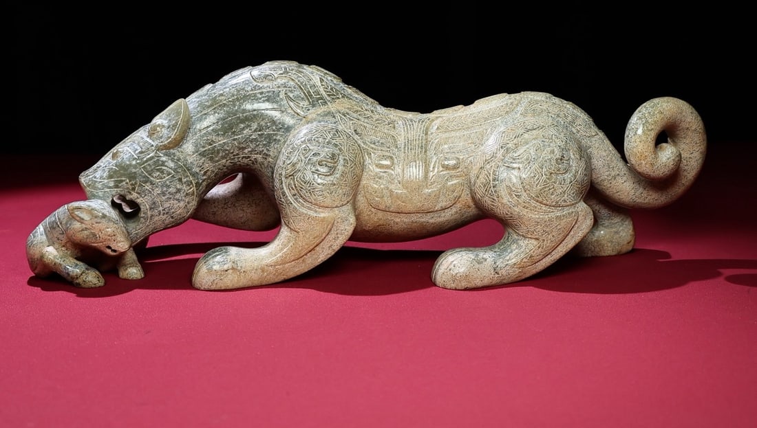 An Exquisite White Jade Auspicious Beast Ornament: An Exquisite White Jade Auspicious Beast Ornament,Qing Dynasty,China,Size:380mmx105mmx109mm,Weight:3892g 白玉瑞兽摆件,中国清代