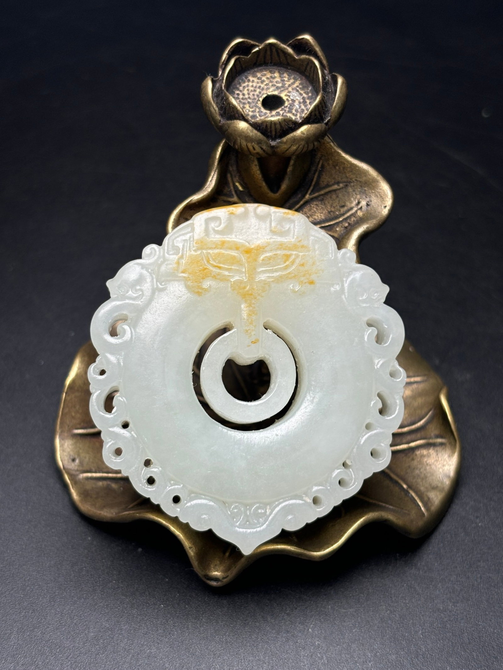 An Exquisite White Jade Beast-Face Pattern Pendant: An Exquisite White Jade Beast-Face Pattern Pendant,Qing Dynasty,China,Size:53mmx48mmx13mm,Weight:58g 白玉兽面纹挂件,中国清代