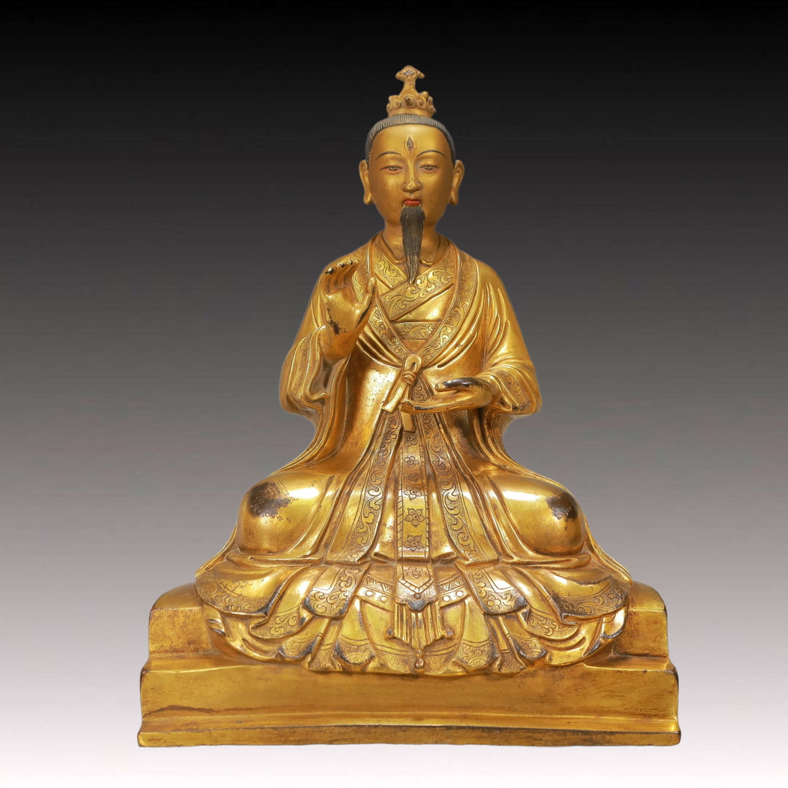 A Solemn Gilt Bronze Statue of Guru: A Solemn Gilt Bronze Statue of Guru,Ming Dynasty, China,Size:9.1inx12.6inx5.9in,Weight:5600g 铜鎏金上师像,中国明代