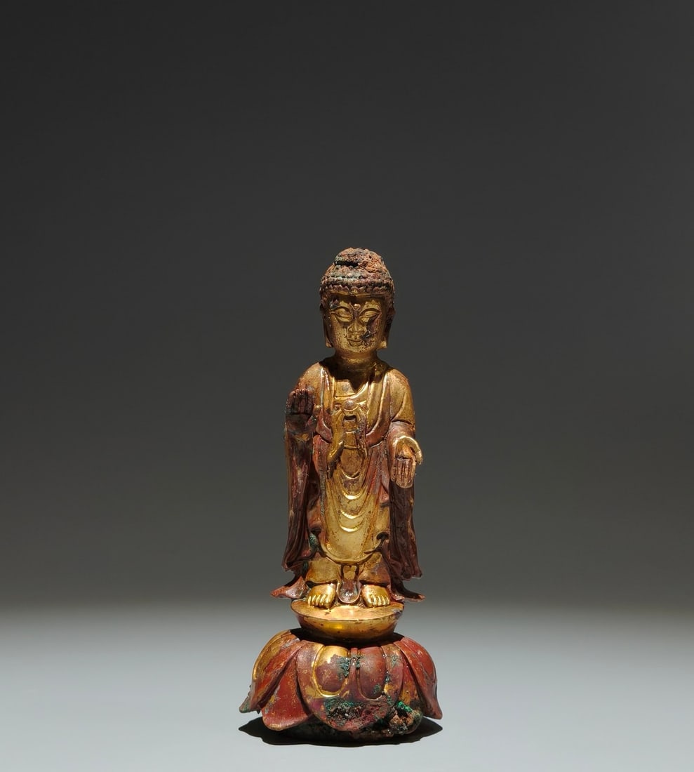 A Solemn Gilt Bronze Statue of Sakyamuni: A Solemn Gilt Bronze Statue of Sakyamuni,Tang Dynasty,China,Size:6.1inx2.6inx1.8in 铜鎏金释迦摩尼像,中国唐代