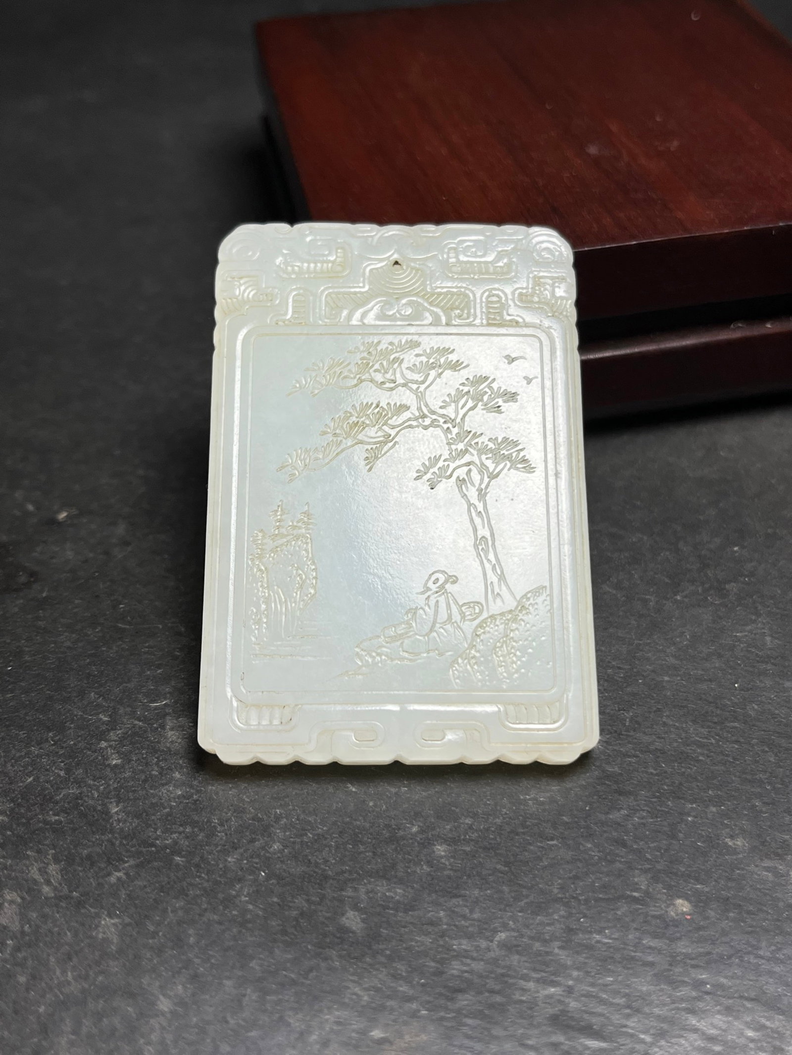 An Exquisite White Jade Landscape and Figure Pattern Pendant,With Poem: An Exquisite White Jade Landscape and Figure Pattern Pendant,With Poem,Qing Dynasty,China,Size:40mmx6mmx60mm,Weight:40g 白玉山水人物纹挂件,带