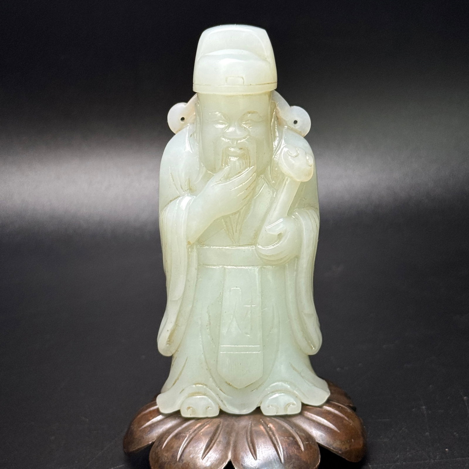 An Exquisite White Jade Statue of Mammon Ornament: An Exquisite White Jade Statue of Mammon Ornament,Qing Dynasty,China,Size:94mmx44mmx13mm,Weight:132g 白玉财神像摆件,中国清代