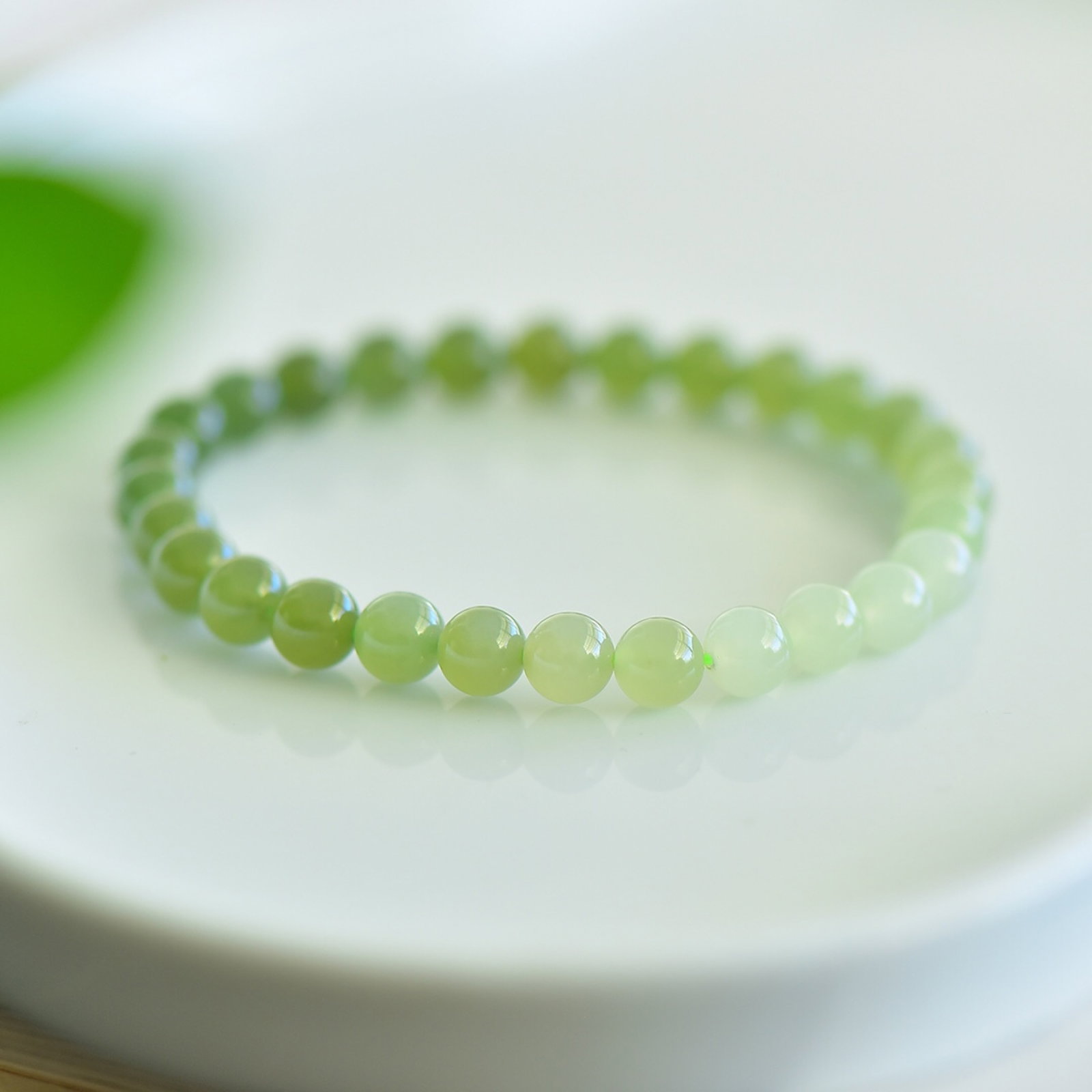 An Exquisite Greenish Jade Bracelets (1 of 5)