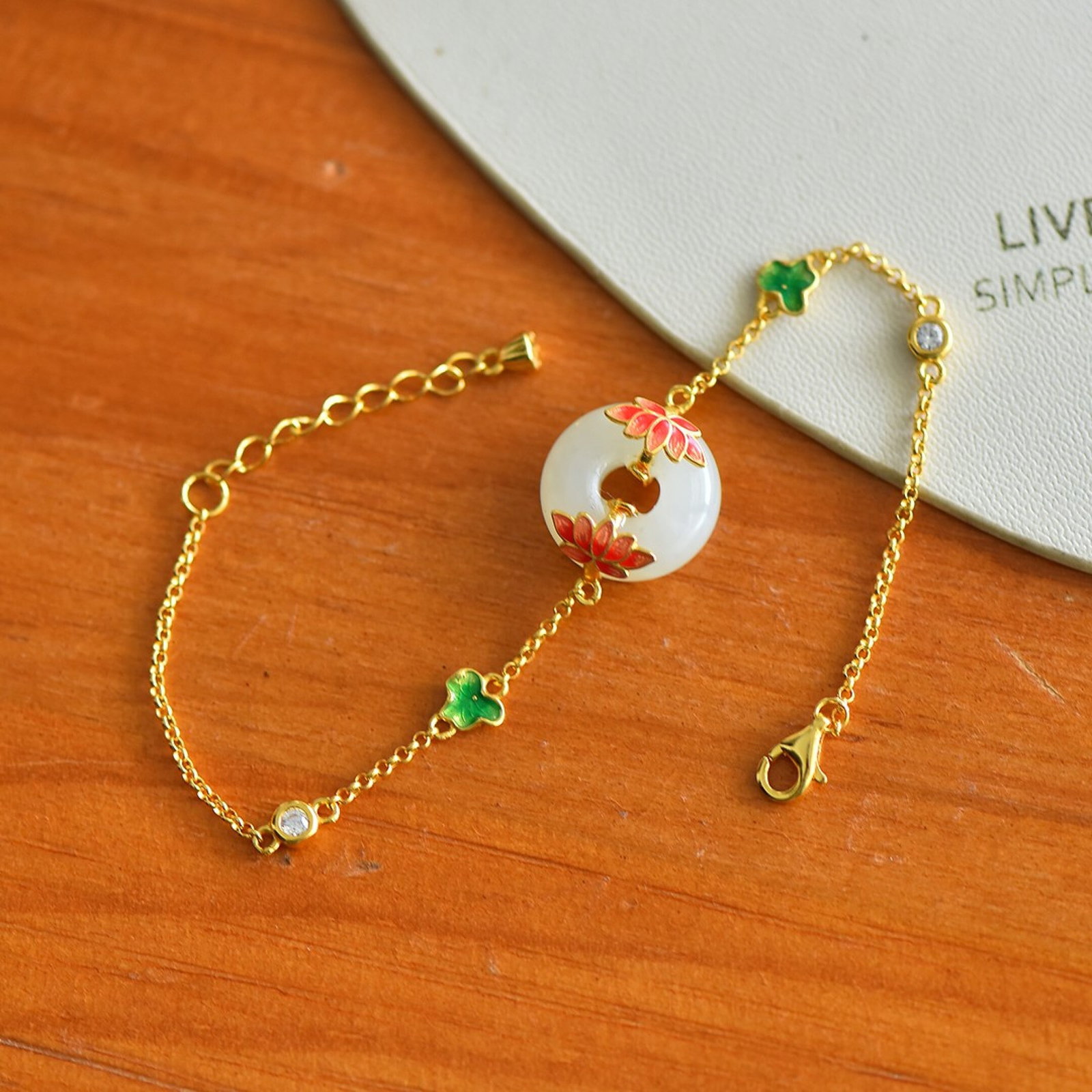 An Exquisite Sterling Silver-Gold Plated Inlaid White Jade Enamel Bracelet: An Exquisite Sterling Silver-Gold Plated Inlaid White Jade Enamel Bracelet,Size:12mmx12mm 纯银镀金镶白玉珐琅手链