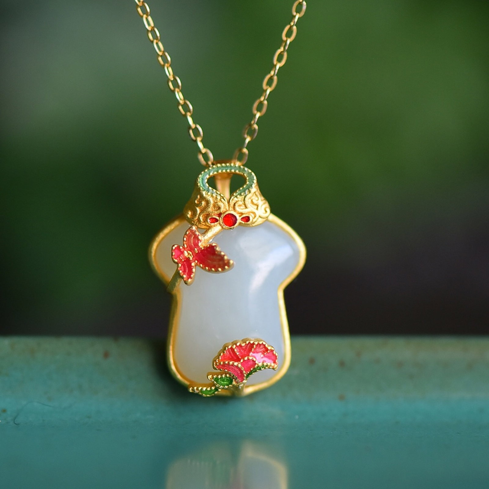 An Exquisite Sterling Silver-Gold Plated Inlaid White Jade Pendant: An Exquisite Sterling Silver-Gold Plated Inlaid White Jade Pendant 纯银镀金镶白玉吊坠
