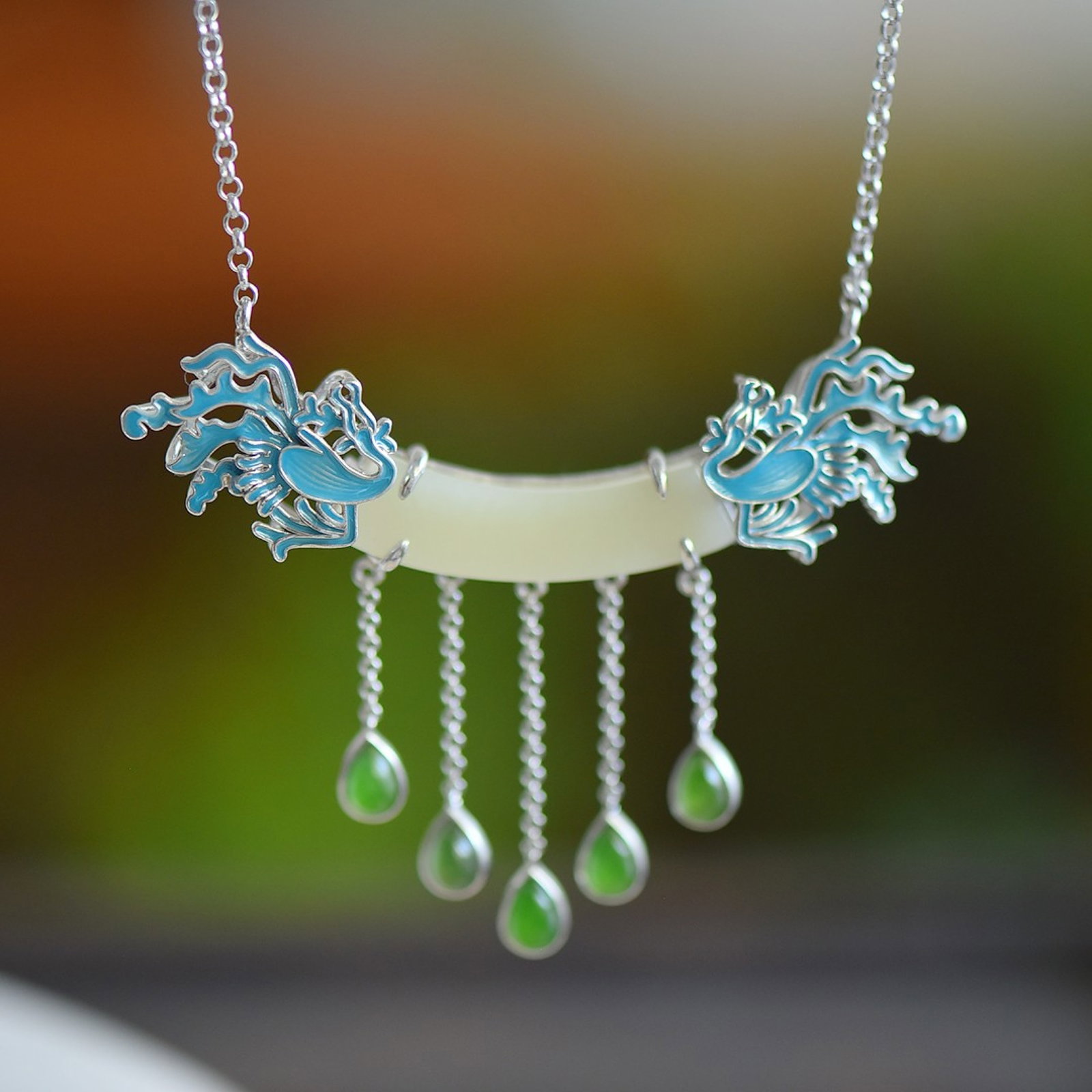 An Exquisite Sterling Silver Inlaid White Jade Pendant,Inlaid Jasper: An Exquisite Sterling Silver Inlaid White Jade Pendant,Inlaid Jasper 纯银镶白玉吊坠，嵌碧玉