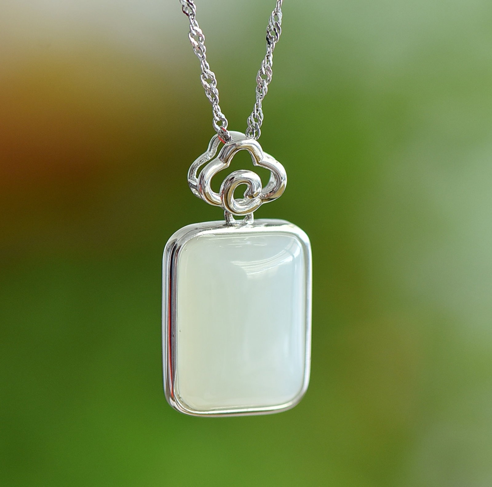 An Exquisite Sterling Silver Inlaid White Jade Pendant: An Exquisite Sterling Silver Inlaid White Jade Pendant,Size:12mmx16mm 纯银镶白玉吊坠