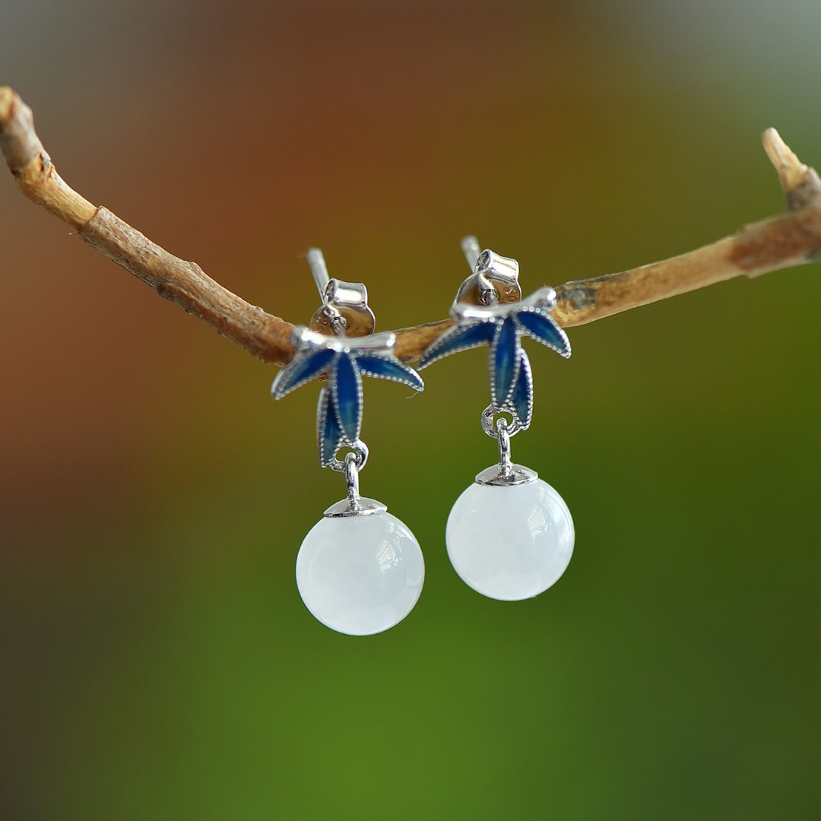 A Pair of Exquisite Sterling Silver Inlaid White Jade Earrings: A Pair of Exquisite Sterling Silver Inlaid White Jade Earrings,Size:8mmx8mm 一对纯银镶白玉耳环