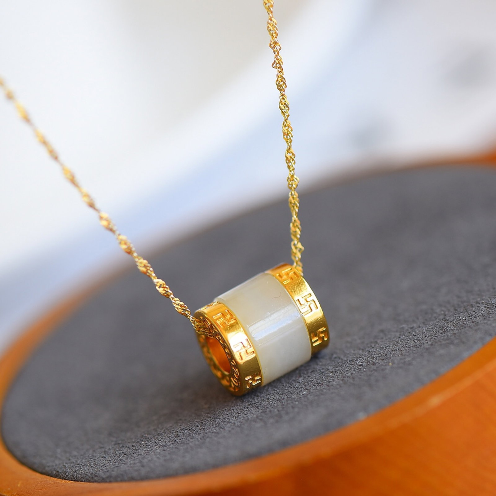 An Exquisite Sterling Silver-Gold Plated Inlaid White Jade Pendant: An Exquisite Sterling Silver-Gold Plated Inlaid White Jade Pendant 纯银镀金镶白玉吊坠