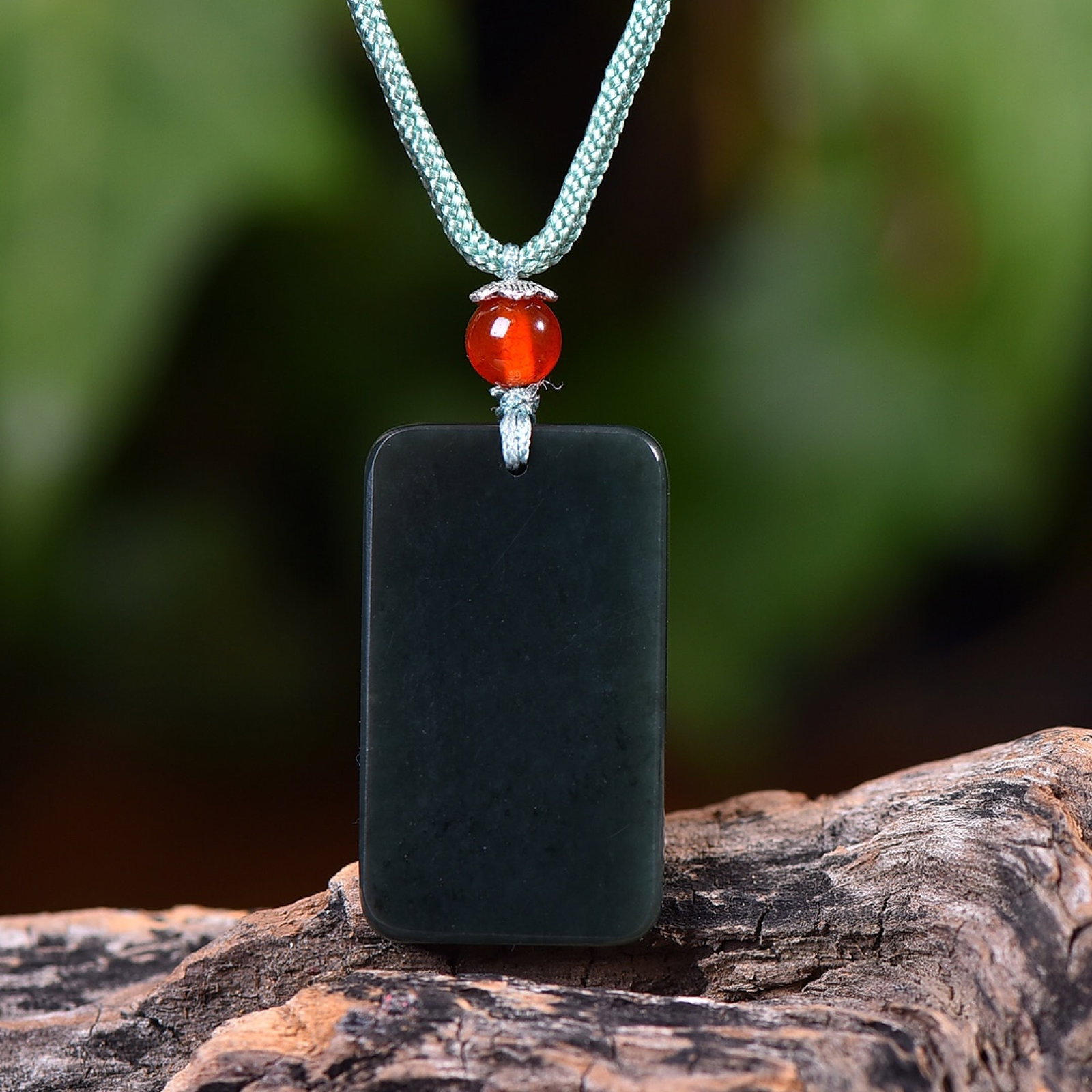 An Exquisite Sapphire Pendant: An Exquisite Sapphire Pendant,Size:20mmx34mm (寓意)寓意吉祥 平安 青玉吊坠