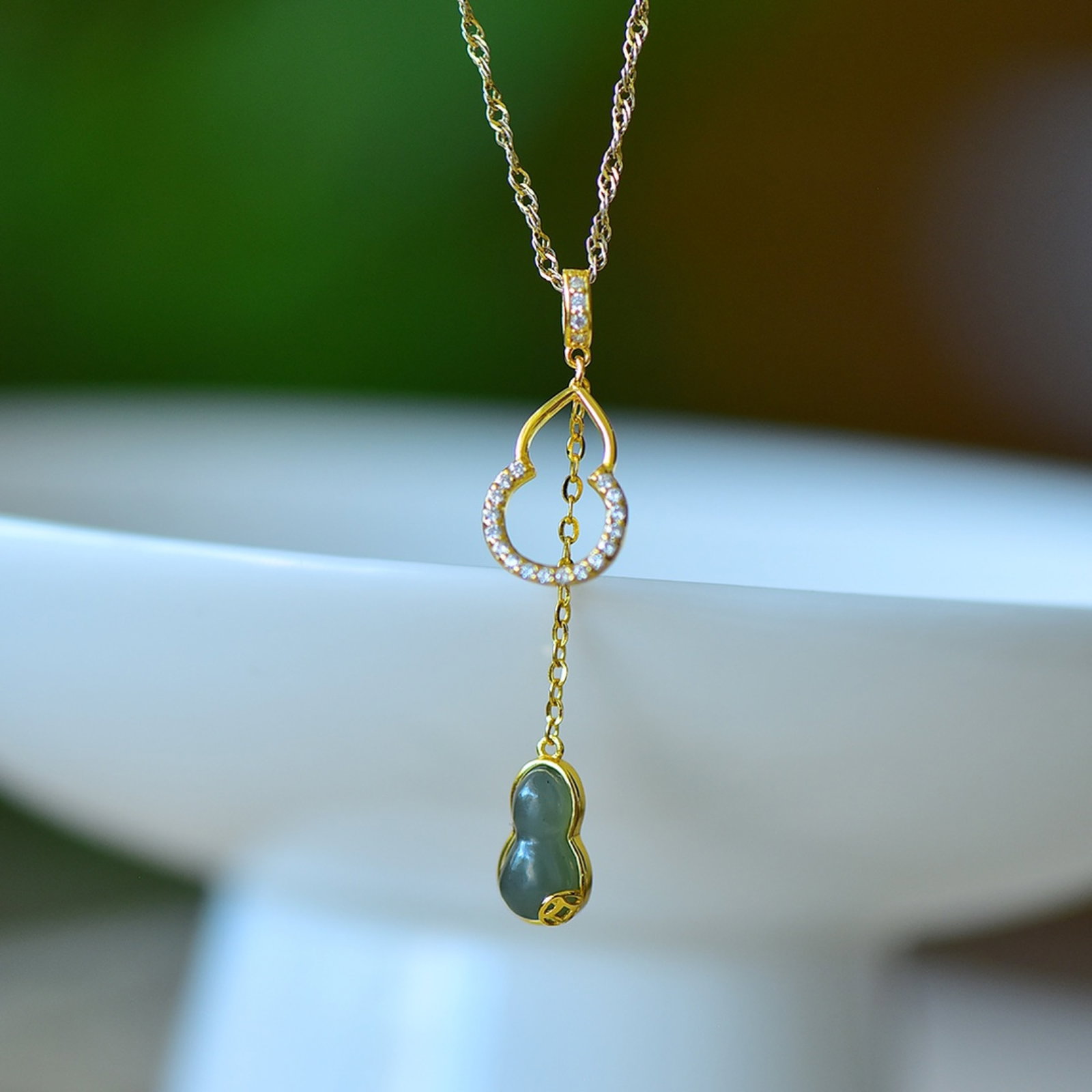 An Exquisite Sterling Silver-Gold Plated Inlaid Greenish Jade Pendant: An Exquisite Sterling Silver-Gold Plated Inlaid Greenish Jade Pendant, 纯银镀金镶青玉吊坠