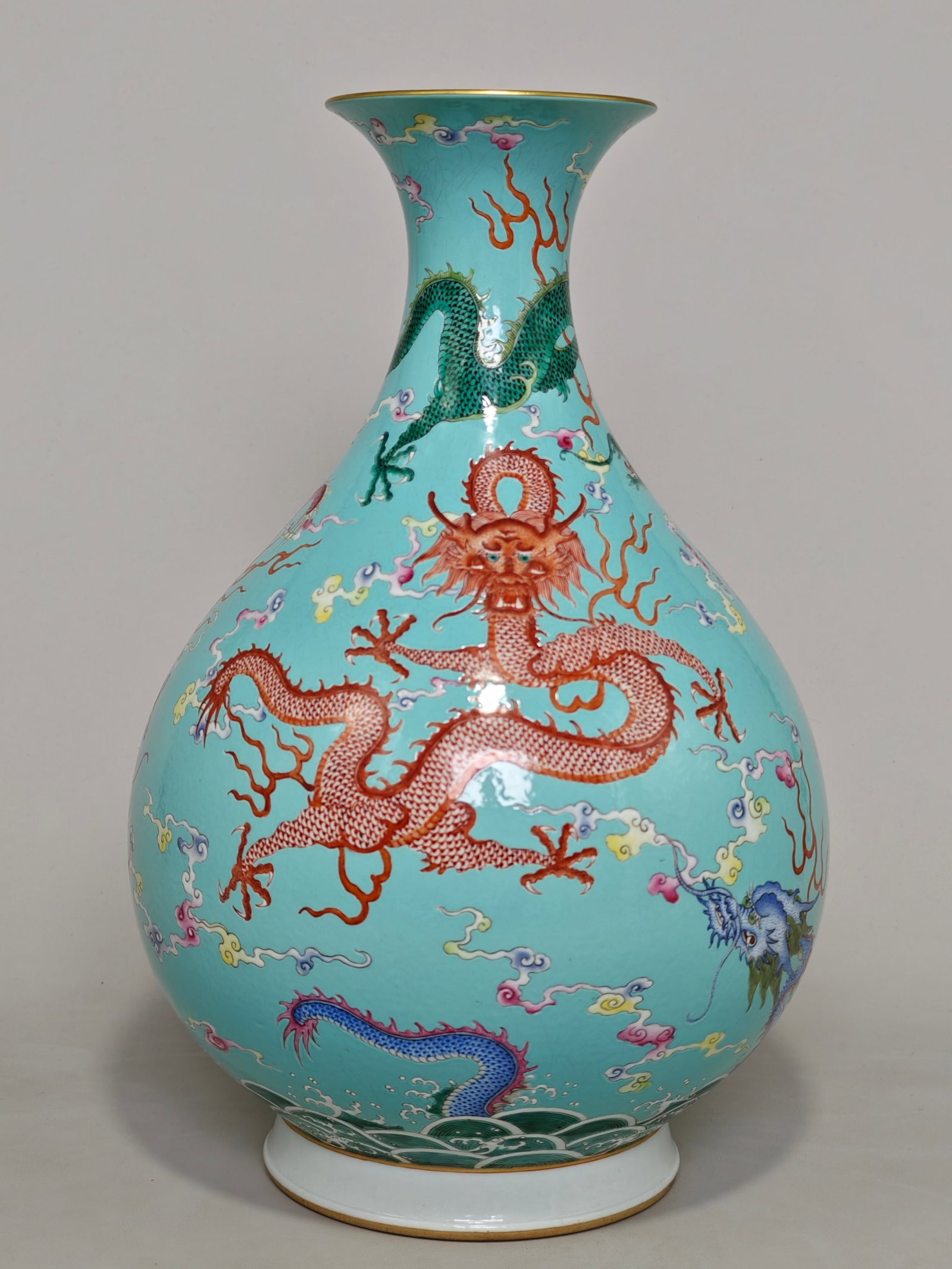 A Rare Famille-Rose Turquoise Ground Painted Gold Auspicious Cloud and Dragon Pattern Vase: A Rare Famille-Rose Turquoise Ground Painted Gold Auspicious Cloud and Dragon Pattern Vase,Qing Dynasty,China,Guangxu Six-character Mark,Size:14.8inx9.8in 粉彩松石绿ß