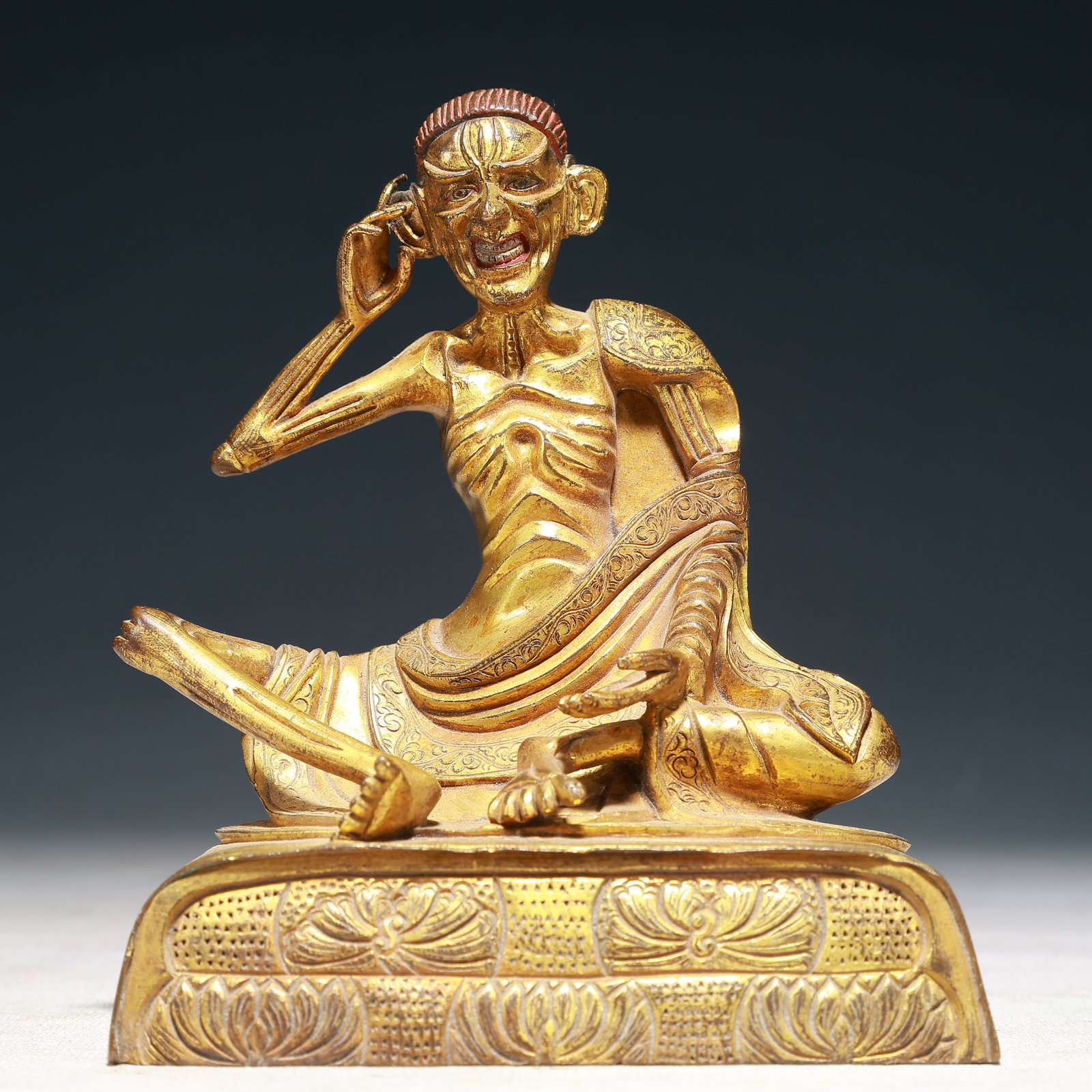 A Solemn Gilt Bronze Statue of Arhat: A Solemn Gilt Bronze Statue of Arhat,Qing Dynasty,China,Size:4.9inx3.3inx5.9in,Weight:1150g 铜鎏金罗汉像,中国清代