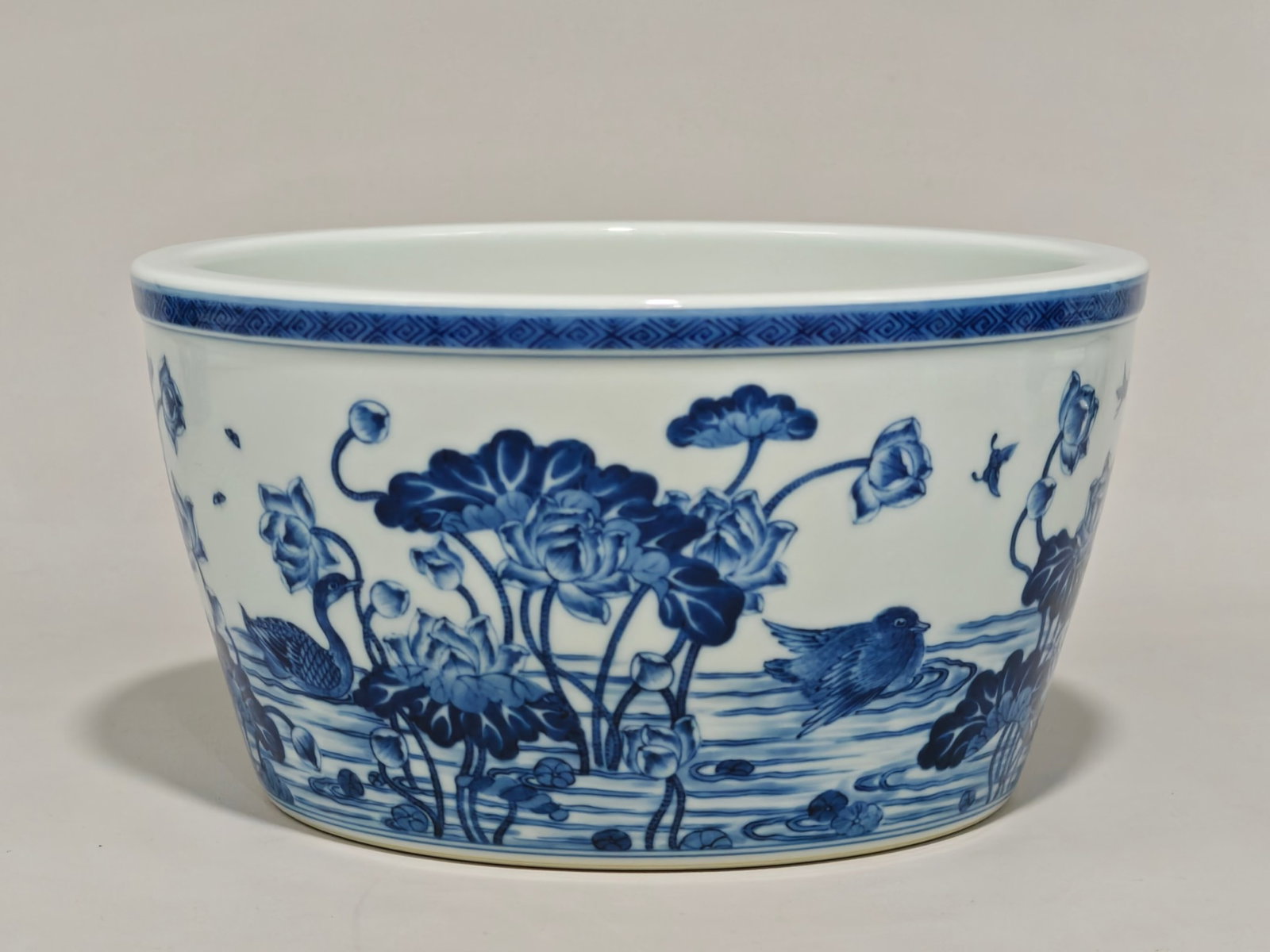 An Exquisite Blue and White Lotus and Duck Pattern Vat: An Exquisite Blue and White Lotus and Duck Pattern Vat,Qing Dynasty,China,Yongzheng Six-character Mark,Size:4.8inx8.9in 青花莲花鸭纹缸,中国清