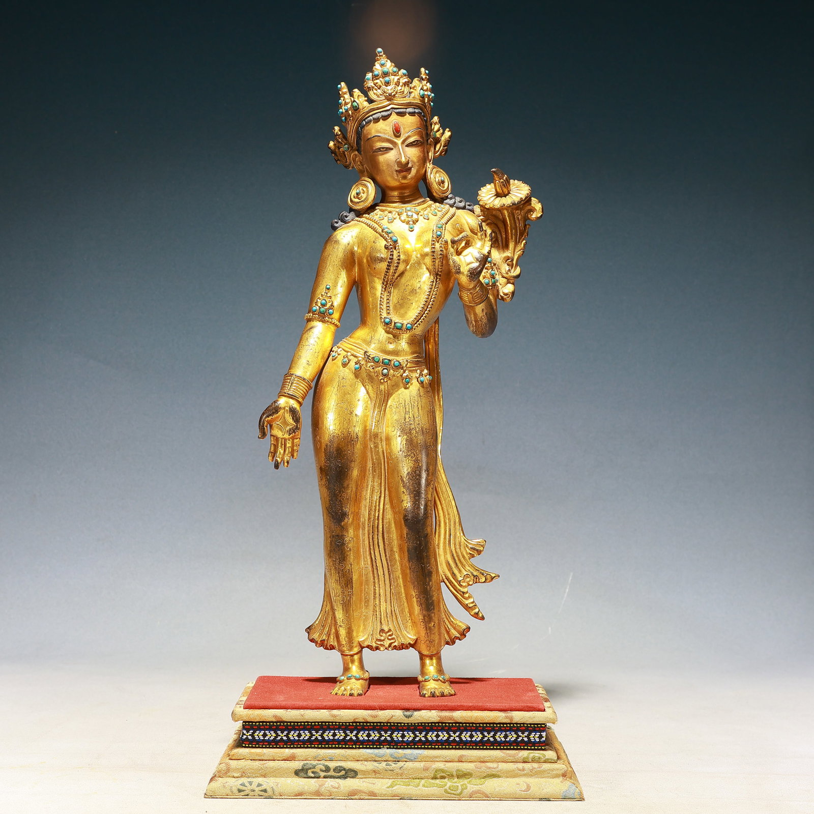 A Solemn Gilt Bronze Statue of Tara,Inlaid Turquoise: A Solemn Gilt Bronze Statue of Tara,Inlaid Turquoise,Qing Dynasty,China,Size:6.7inx2inx17.3in,Weight:5600g 铜鎏金度母像,嵌绿松石,中