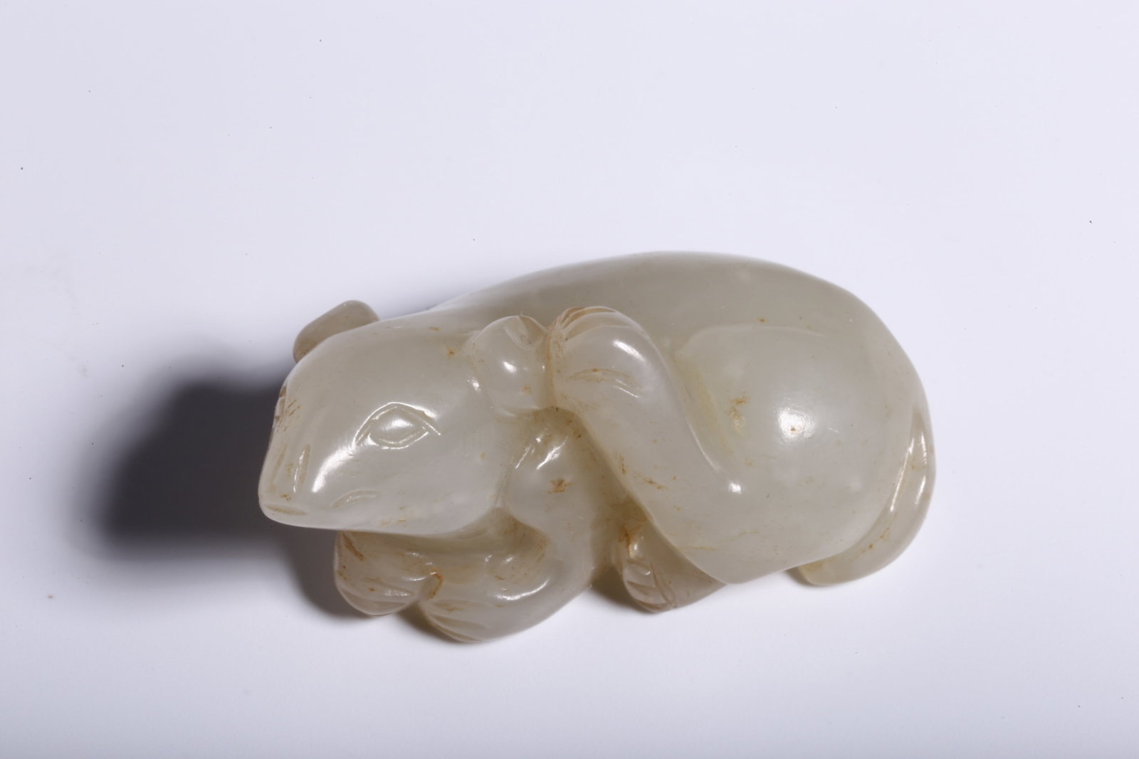 An Exquisite White Jade Animal Ornament: An Exquisite White Jade Animal Ornament,Qing Dynasty,China,Size:1.6inx0.9inx0.7in,Weight:22g 白玉动物摆件，中国清代