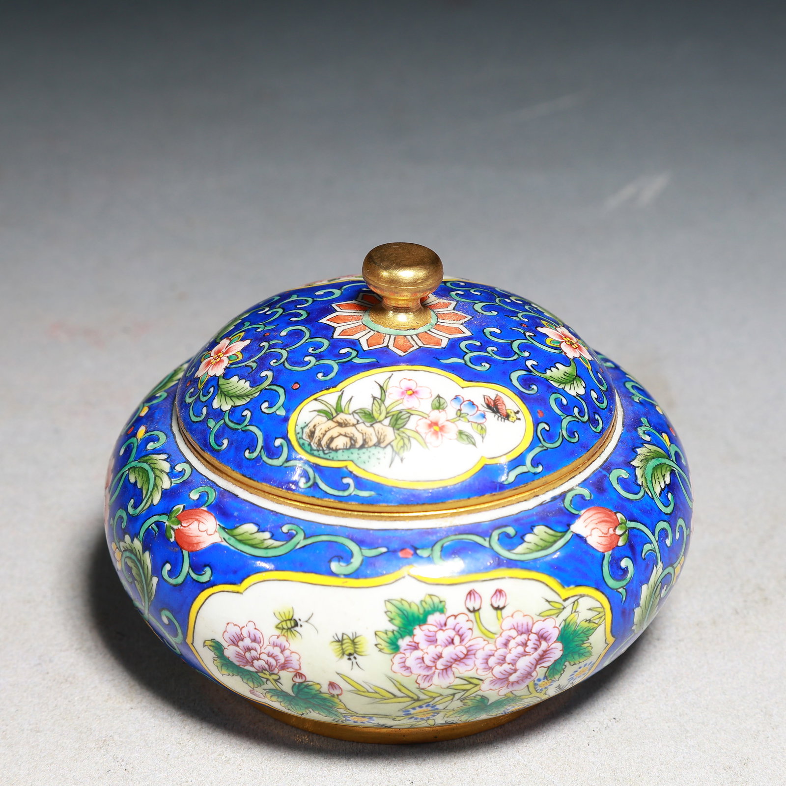 An Exquisite Painted Enamel Flower and Butterfly Pattern Jar with Cover: An Exquisite Painted Enamel Flower and Butterfly Pattern Jar with Cover,Qing Dynasty,China,Qianlong Four-character Mark,Size:3.9inx3in,Weight:300g 画珐琅花卉蝴Ś