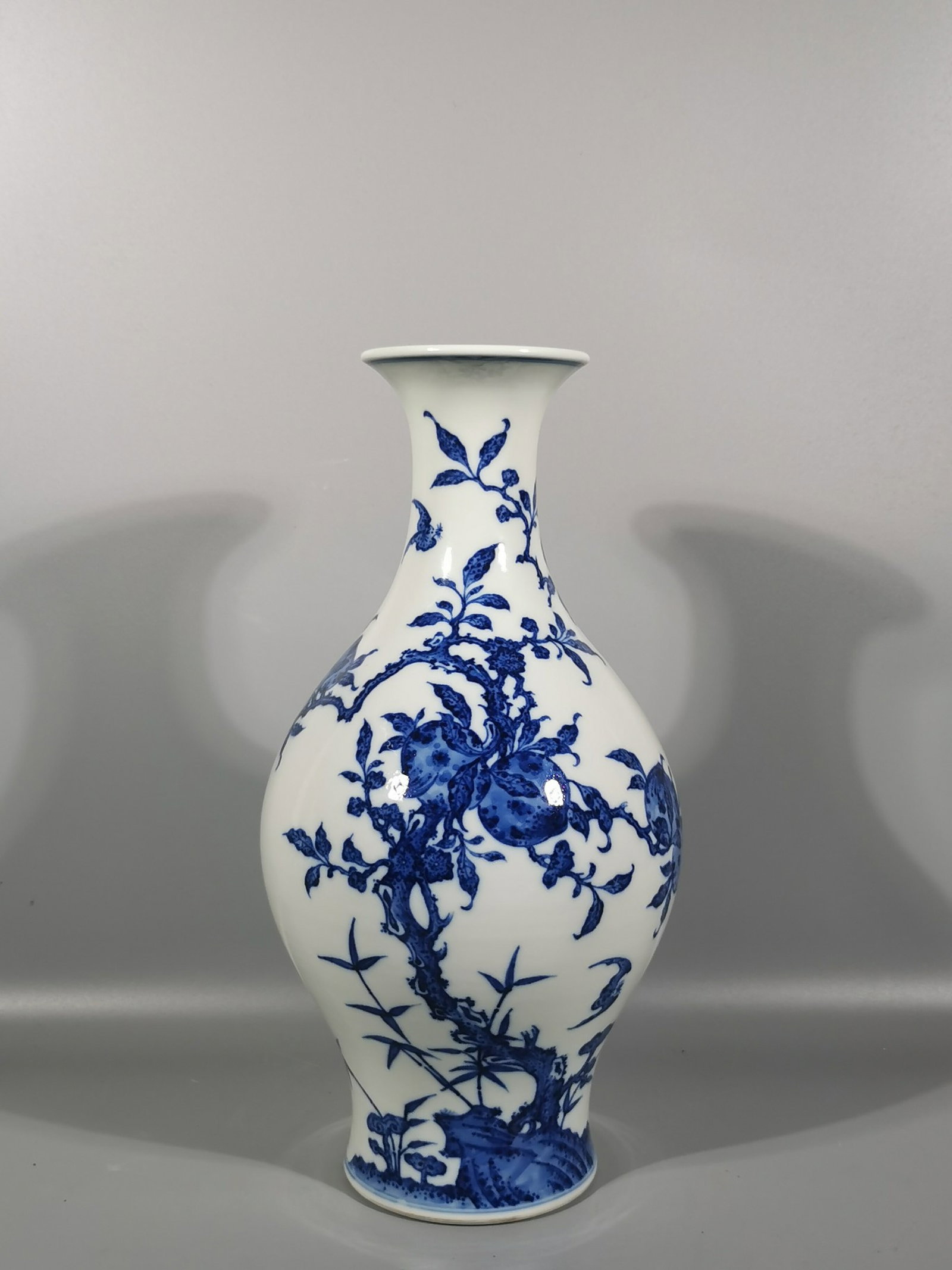 A Rare Blue and White Bats and Peach Pattern Vase: A Rare Blue and White Bats and Peach Pattern Vase,Qing Dynasty,China,Yongzheng Six-character Mark,Size:13.4inx3.5inx6.7in 青花福寿纹瓶,中国清É