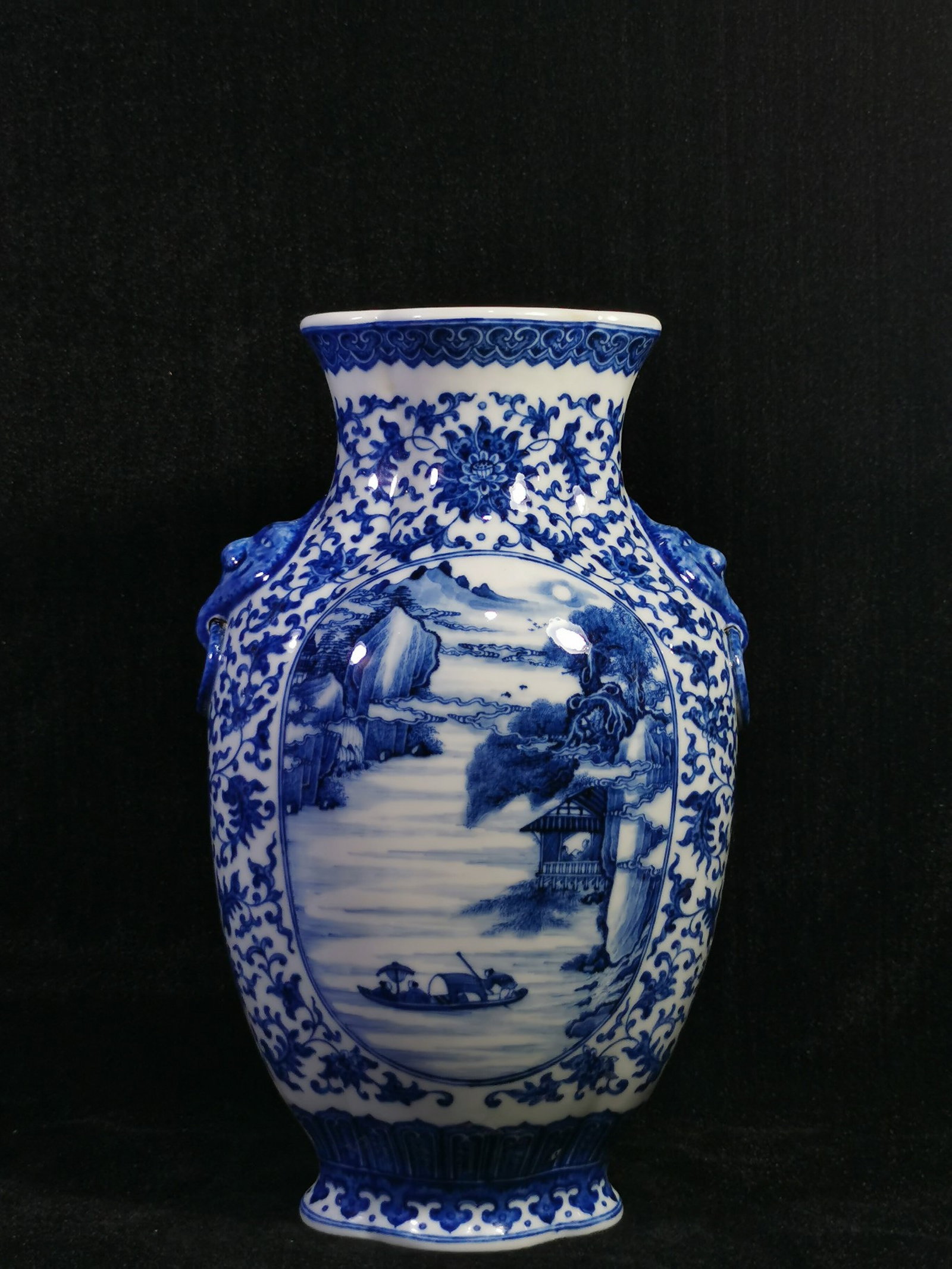 A Rare Blue and White Lotus?Landscape and Figure Pattern Beast-Ears Vase: A Rare Blue and White Lotus，Landscape and Figure Pattern Beast-Ears Vase,Qing Dynasty,China,Yongzheng Six-character Mark,Size:12.4inx4.9in 青花缠枝莲山૒