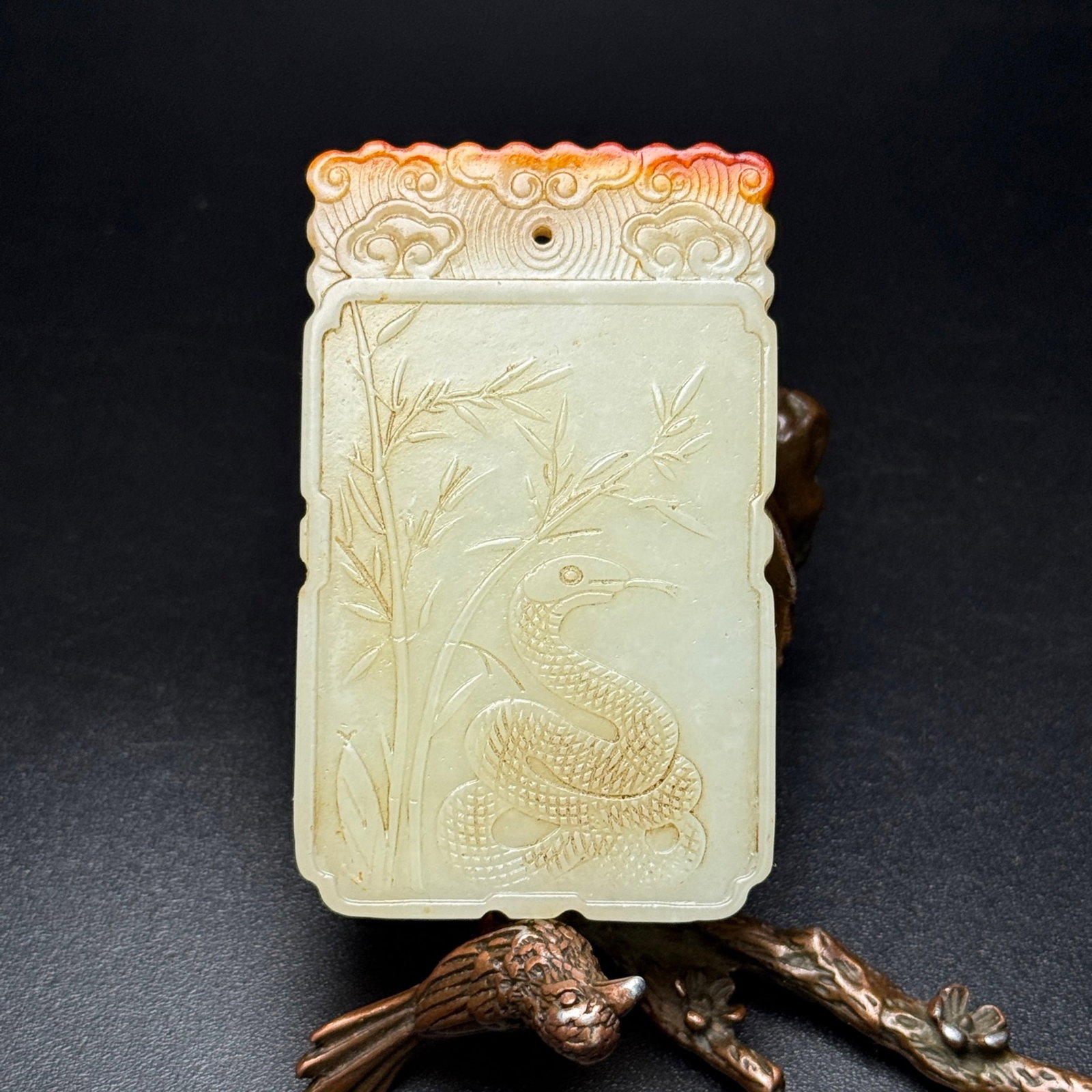 An Exquisite White Jade Snake Pattern Pendant: An Exquisite White Jade Snake Pattern Pendant,Qing Dynasty,China,Size:42mmx69mmx6mm,Weight:53g 白玉蛇纹挂件,中国清代