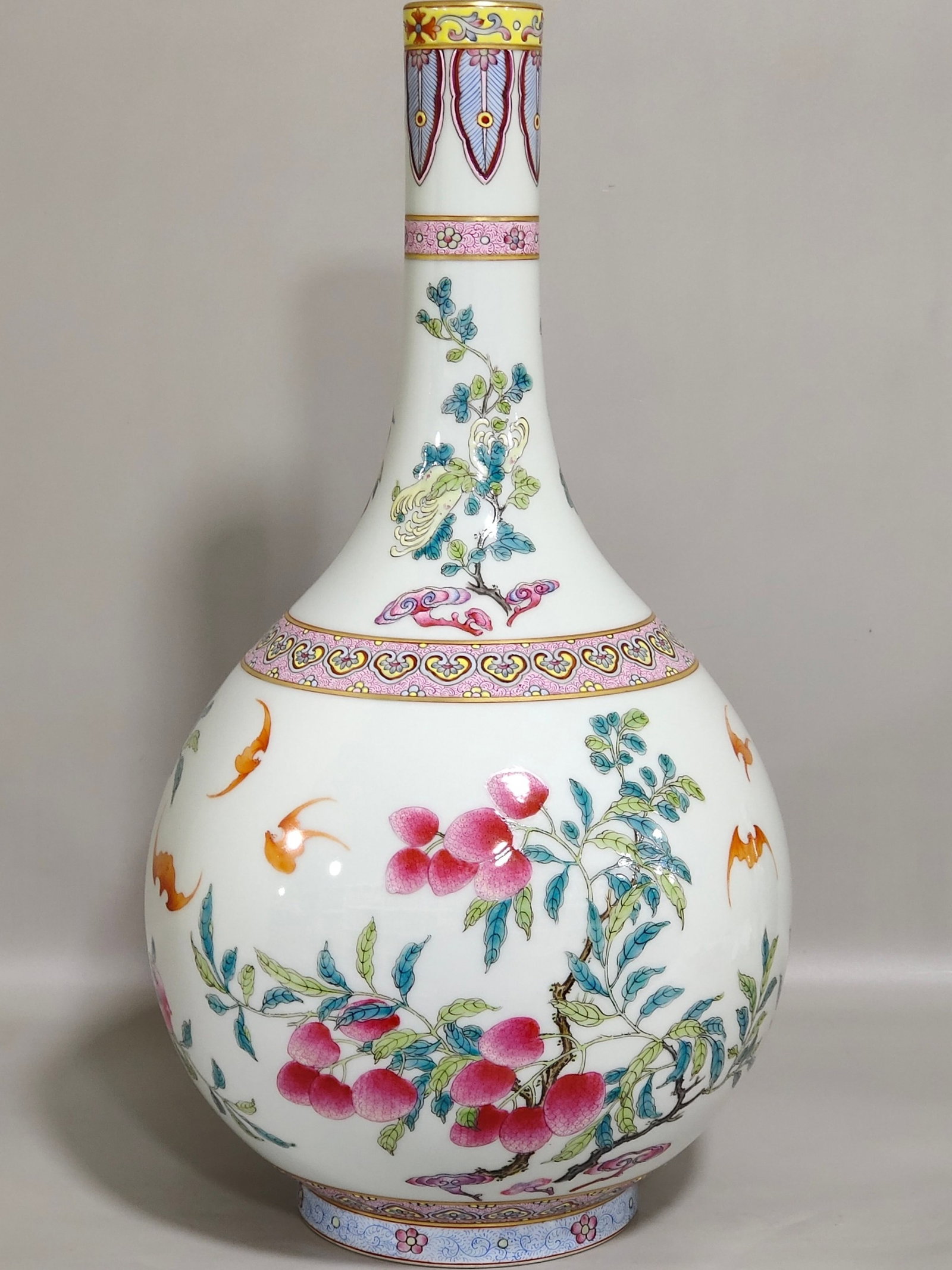 A Rare Famille-Rose Painted Gold Bats and Fruit Pattern Vase: A Rare Famille-Rose Painted Gold Bats and Fruit Pattern Vase,Qing Dynasty,China,Qianlong Six-character Mark,Size:13.6inx6.9in 粉彩描金蝙蝠果纹瓶,&