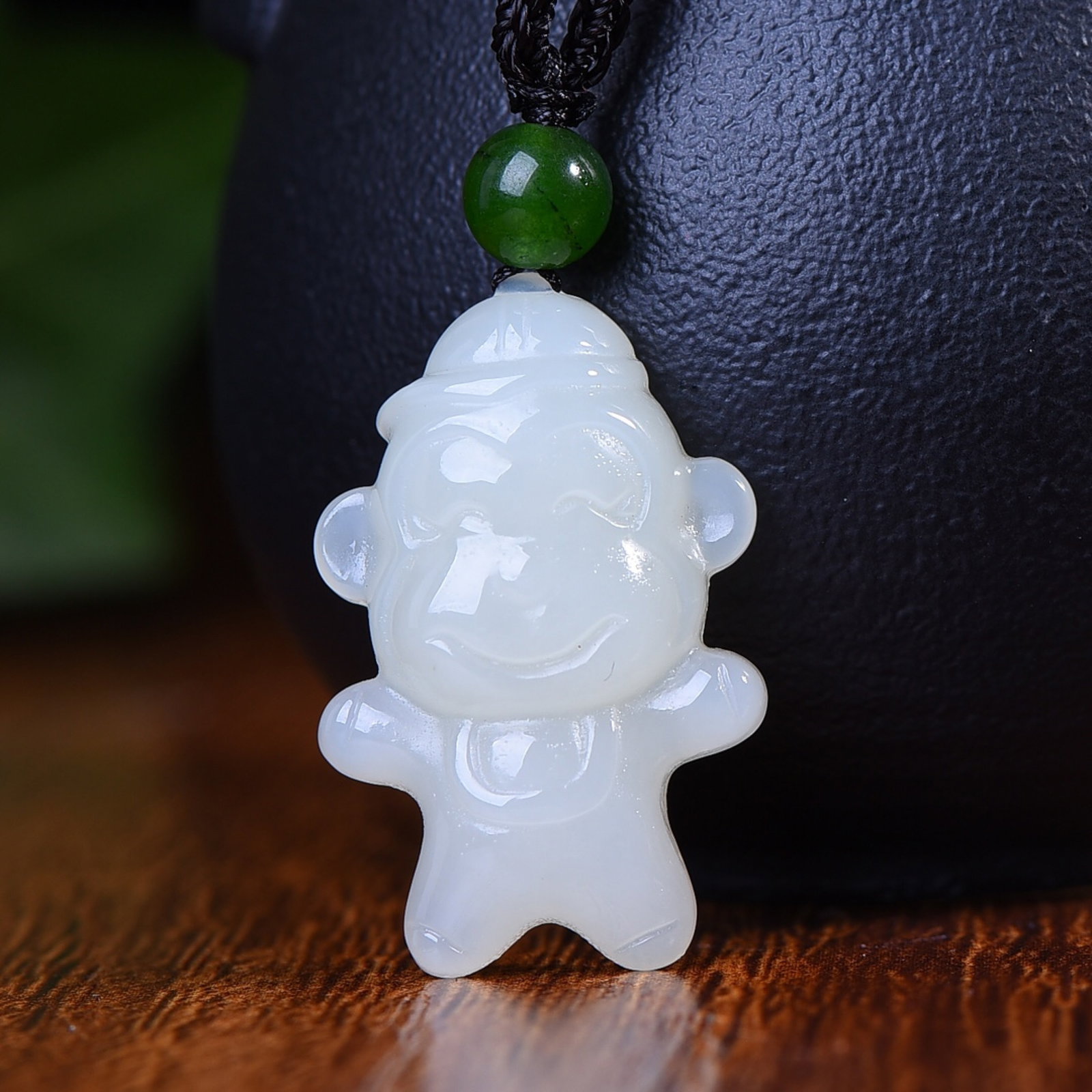 An Exquisite White Jade Monkey Pendant: An Exquisite White Jade Monkey Pendant,Size:30mmx21mm (寓意)佩戴给我们带来 聪明 智慧 财源滚滚 
