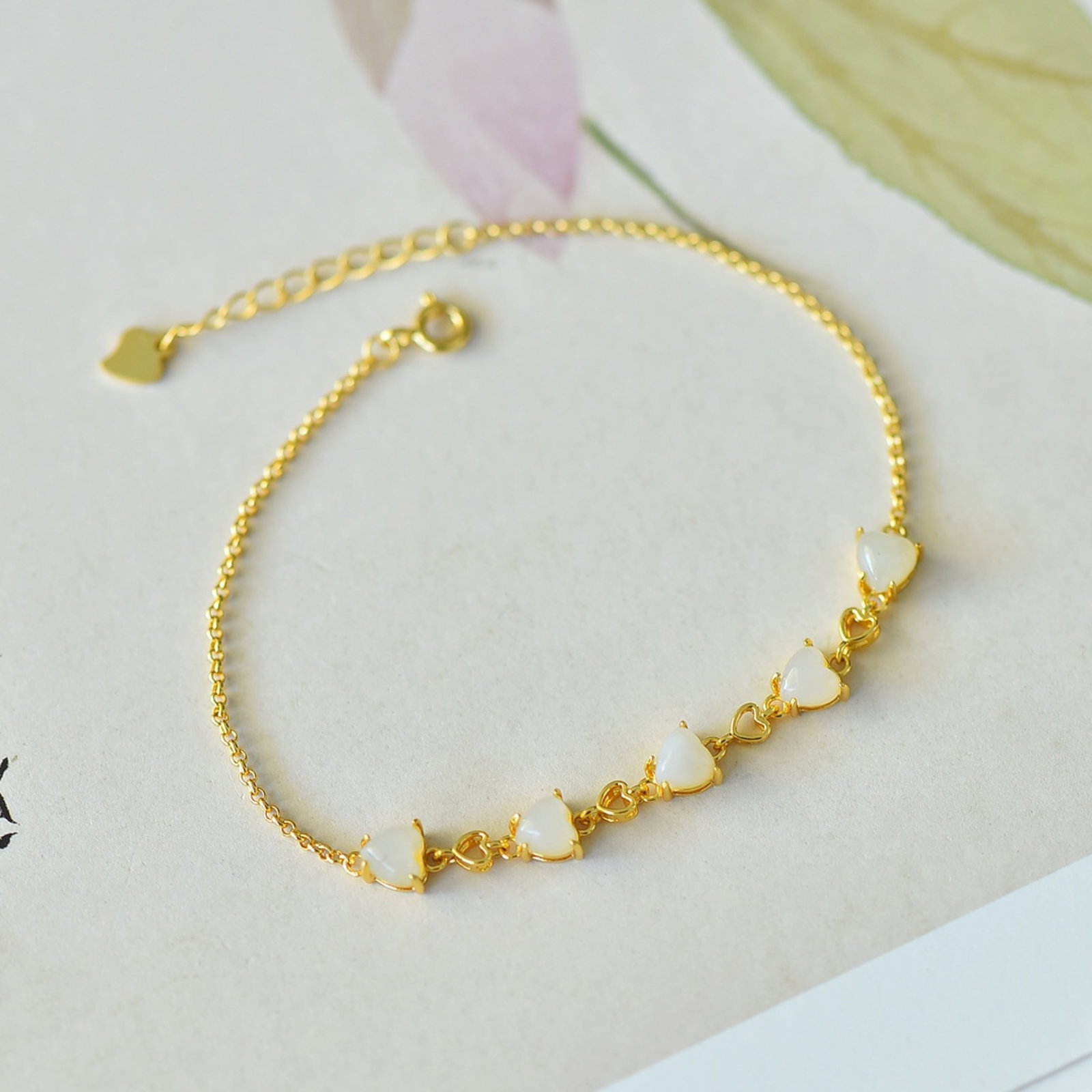 An Exquisite Sterling Silver-Gold Plated Inlaid White Jade Bracelets: An Exquisite Sterling Silver-Gold Plated Inlaid White Jade Bracelets,Size:5mmx5mm 纯银镀金镶白玉手链