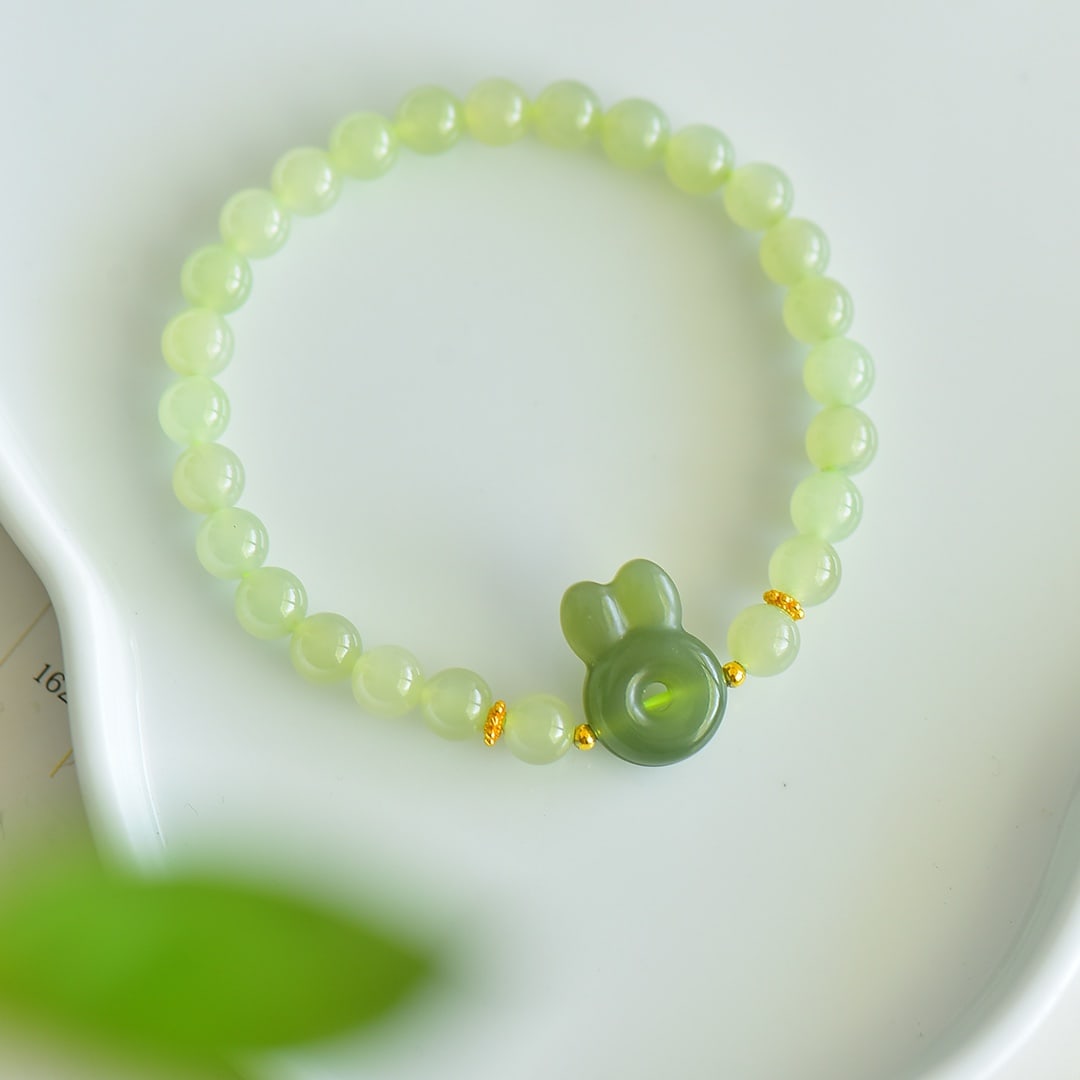 An Exquisite Greenish Jade Bracelets: An Exquisite Greenish Jade Bracelets,Size:6mm 青白玉手串