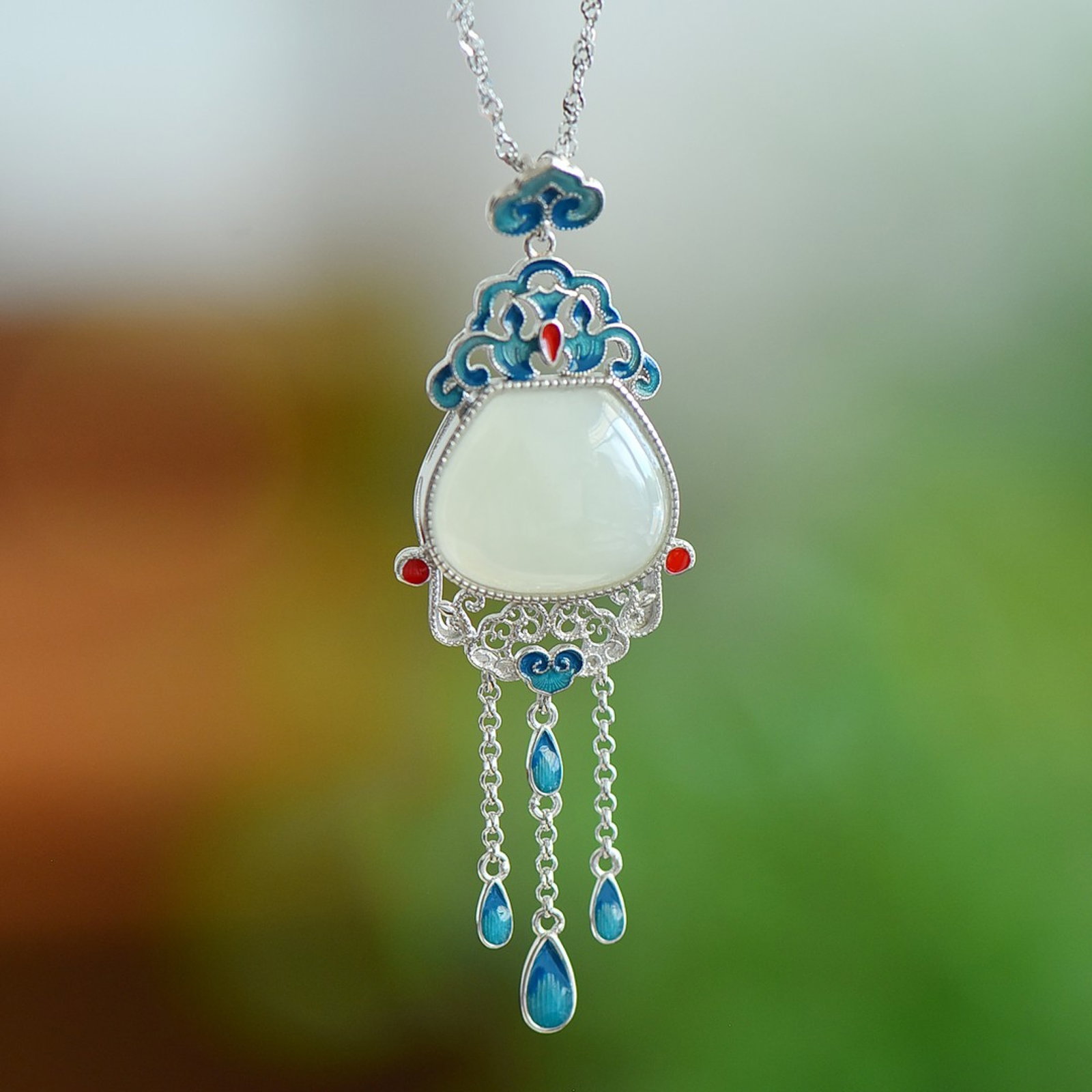 An Exquisite Sterling Silver Inlaid White Jade Pendant: An Exquisite Sterling Silver Inlaid White Jade Pendant,Size:13mmx16mm 纯银镶白玉吊坠