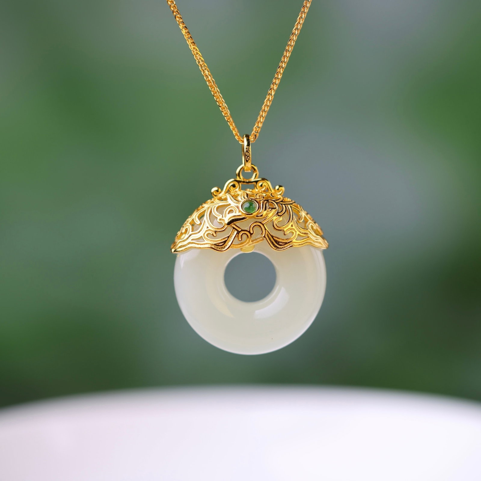 An Exquisite Sterling Silver-Gold Plated Inlaid White Jade Pendant: An Exquisite Sterling Silver-Gold Plated Inlaid White Jade Pendant,Size:25mmx25mm 纯银镀金镶白玉吊坠