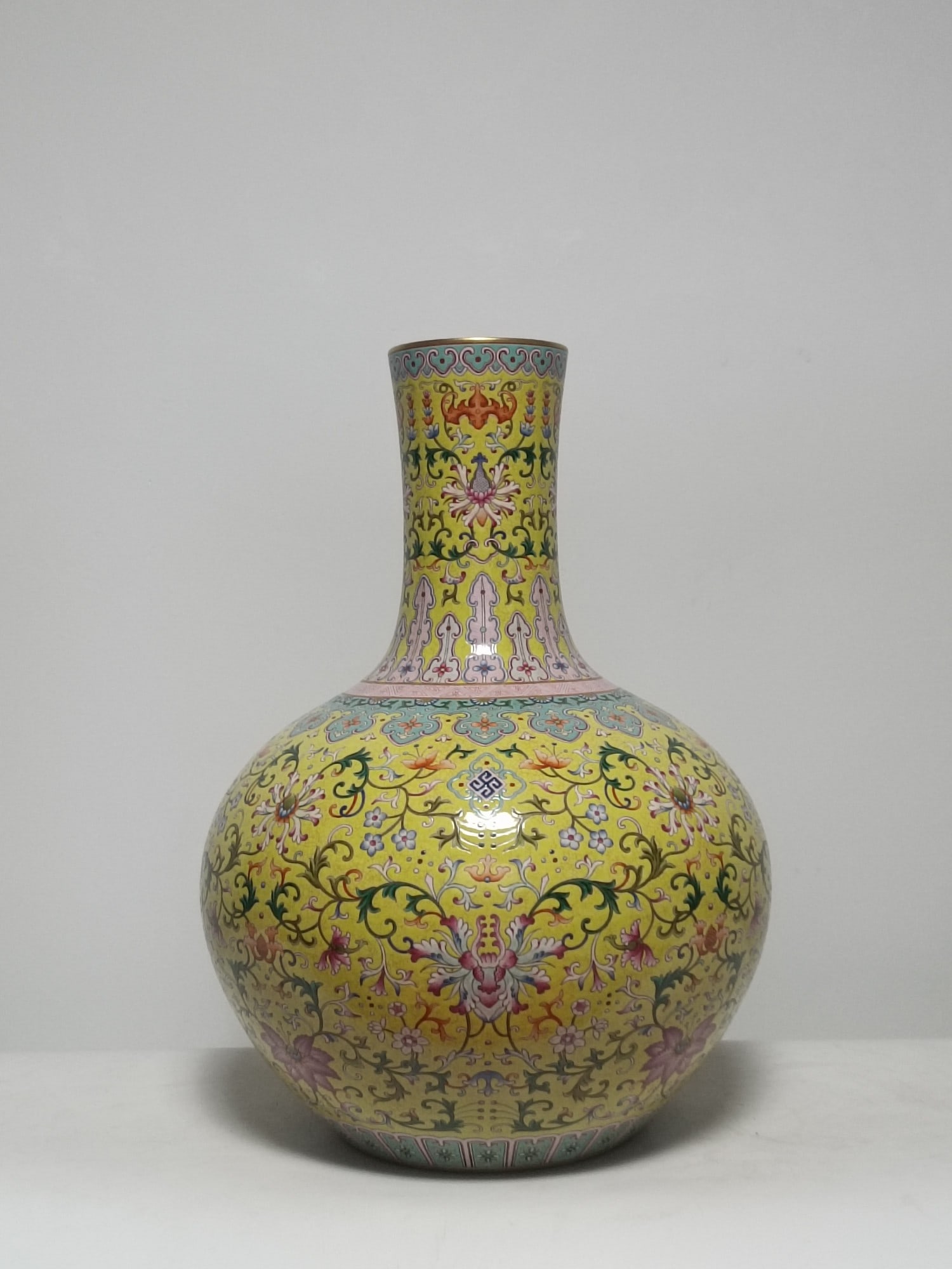 A Huge Yellow Ground Famille-Rose Lotus Pattern Vase: A Huge Yellow Ground Famille-Rose Lotus Pattern Vase,Qing Dynasty,China,Qianlong Six-character Mark,Size:22.8inx16.5in 黄地粉彩缠枝莲纹瓶,中