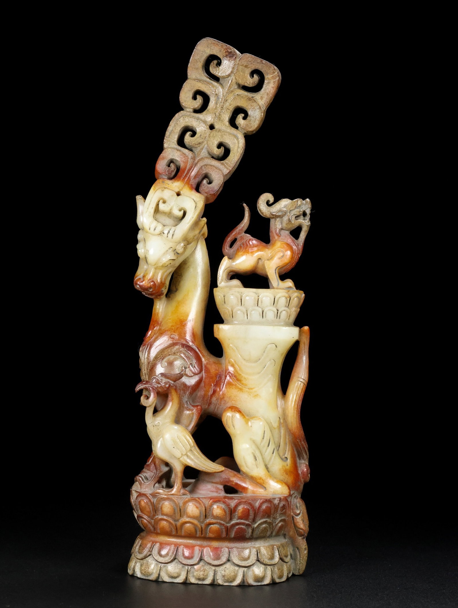 An Archaic Gaogu yu Auspicious Beast Ornament: An Archaic Gaogu yu Auspicious Beast Ornament,Ancient Time, China, Size:3.3inx2.6inx10.2in, Weight:1100g 高古玉瑞兽纹摆件,中国远ࡣ