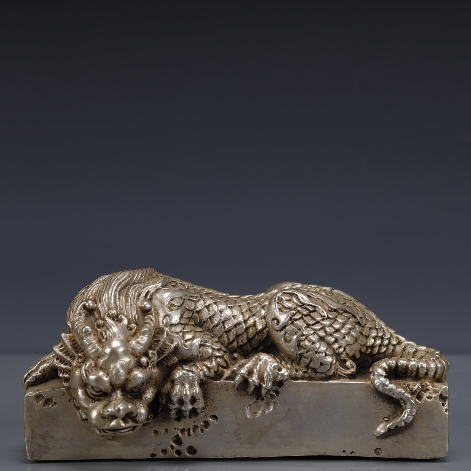 An Exquisite Silver-Plated Bronze Auspicious Beast Ornament: An Exquisite Silver-Plated Bronze Auspicious Beast Ornament,The Republic of China,Size:6.7inx3.1inx3.1in,Weight:1100g 铜镀银瑞兽摆件,中国民&