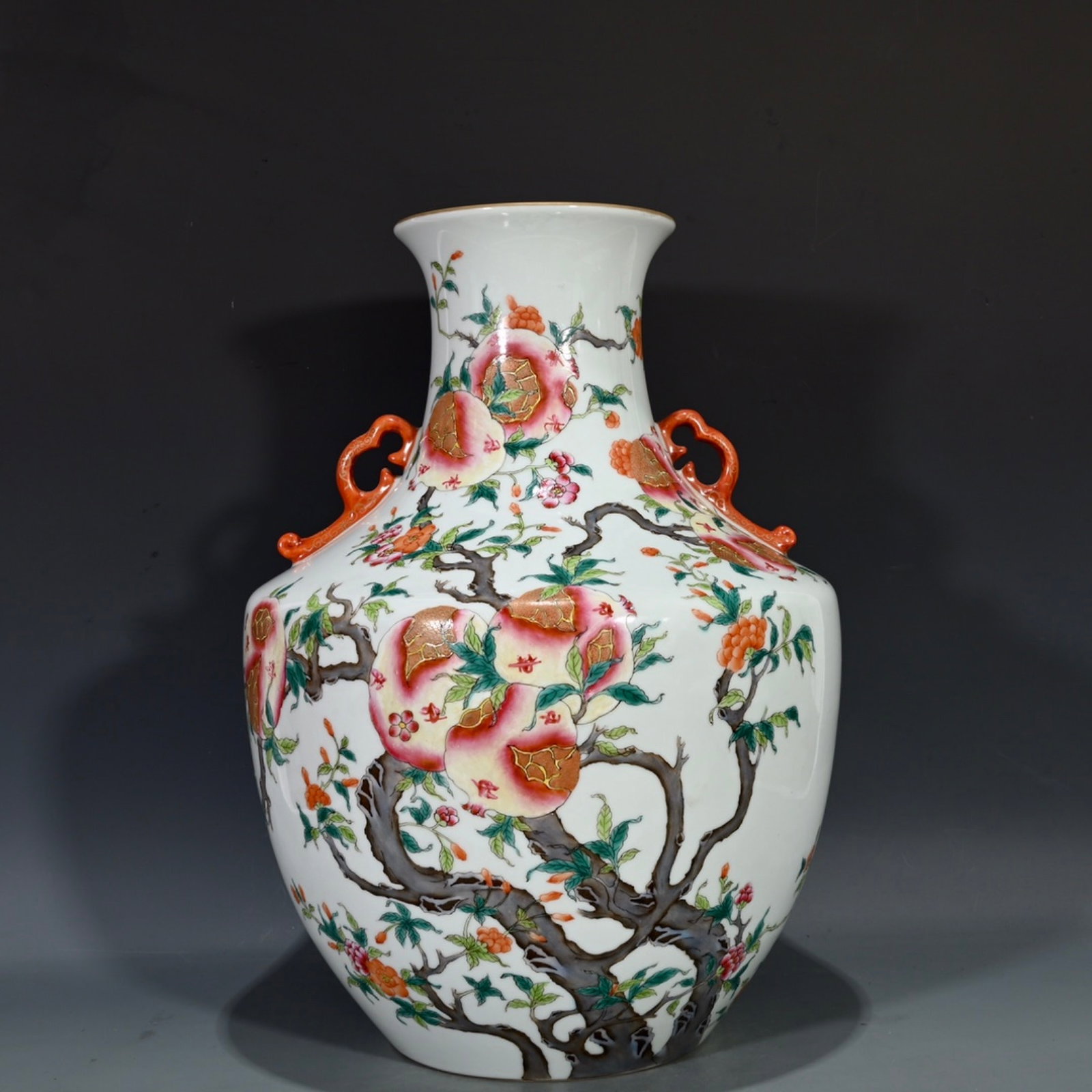 A Rare Famille-Rose Painted Gold Pomegranate Pattern Double-Ears Vase: A Rare Famille-Rose Painted Gold Pomegranate Pattern Double-Ears Vase,Qing Dynasty,China,Qianlong Six-character Mark,Size:14.6inx8.3in 粉彩描金石榴纹双&