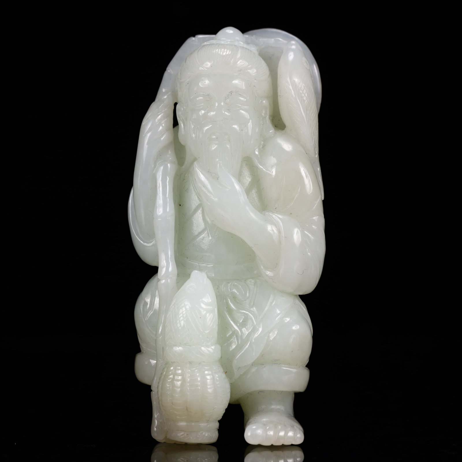 An Exquisite White Jade Figure Ornament: An Exquisite White Jade Figure Ornament,Qing Dynasty, China,Size:1.8inx1.6inx3.5in,Weight:192g 白玉人物摆件,中国清代