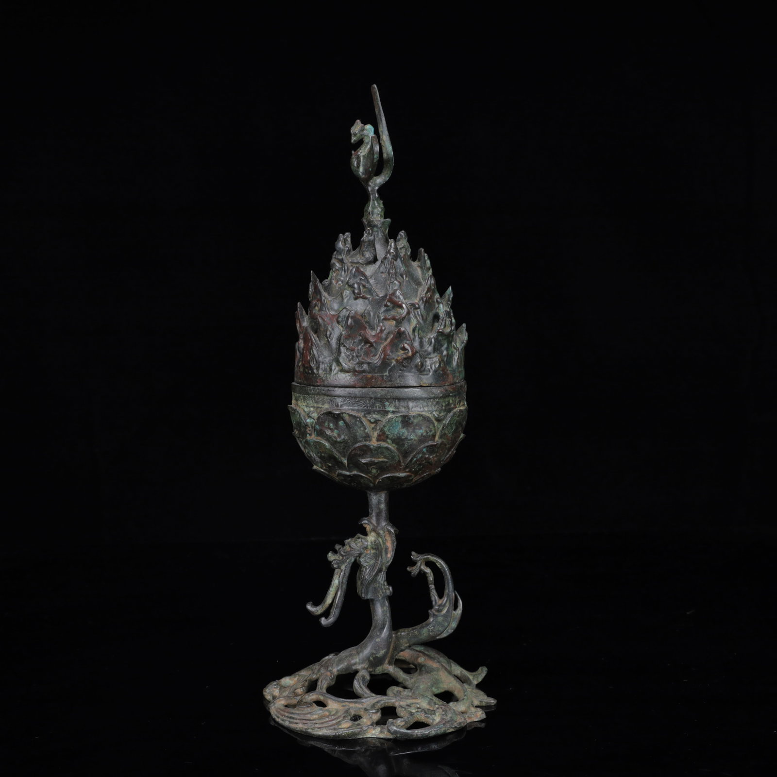An Archaic Bronze Dragon Phoenix Censer: An Archaic Bronze Dragon Phoenix Censer,the Warring States Period in China,Size:4.3inx11.8in,Weight:150g 青铜龙凤香炉,中国战国时੏