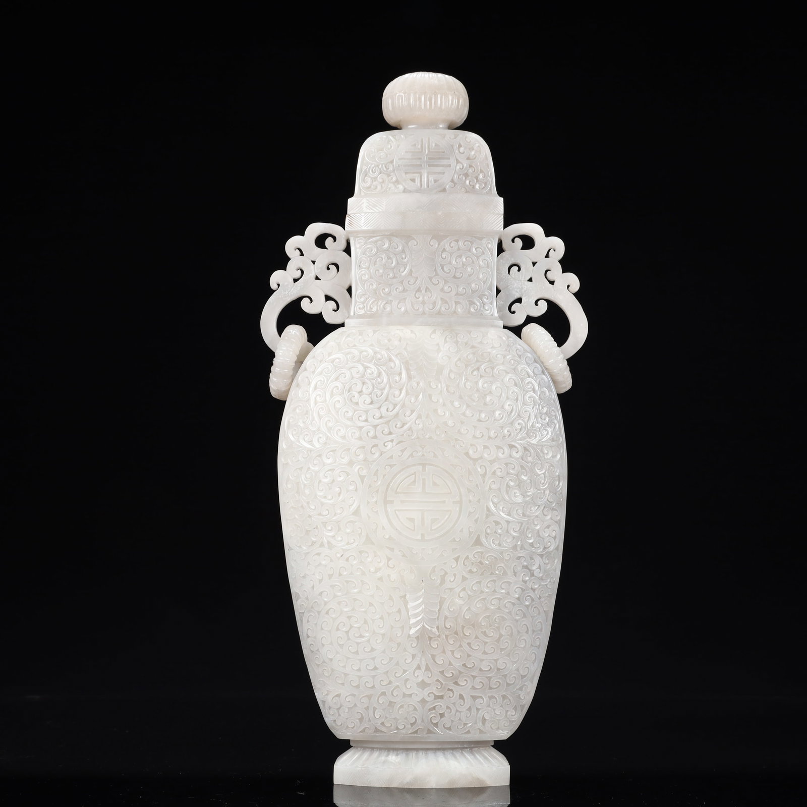 A Rare White Jade Flower Pattern Double-Ears Bottle: A Rare White Jade Flower Pattern Double-Ears Bottle,Qing Dynasty, China,Size:1.8inx6.7inx14.6in,Weight:2850g 白玉花卉纹双耳盖瓶,中国&#