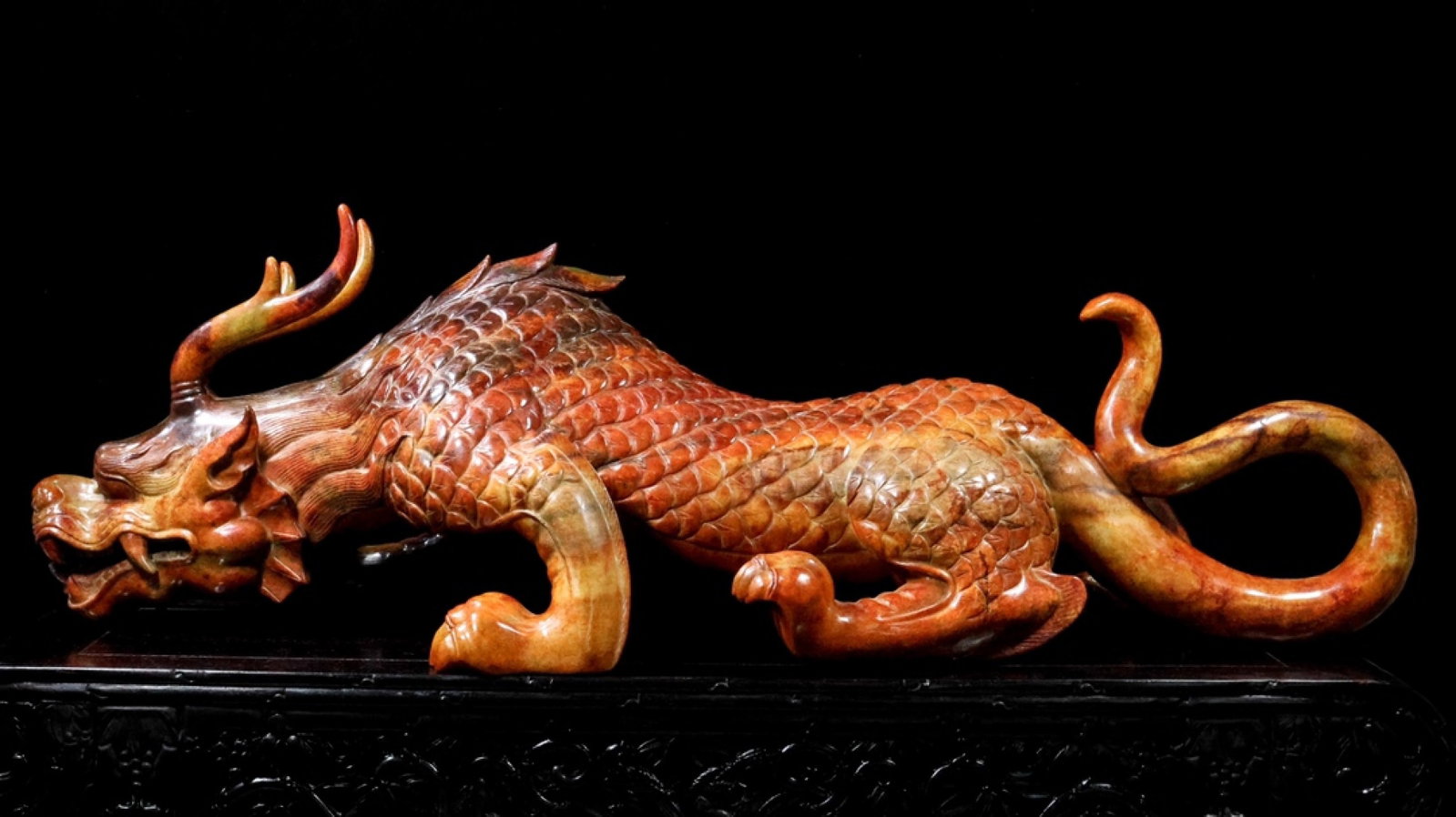 An Archaic Gaogu yu Auspicious Beast Ornament (1 of 9)