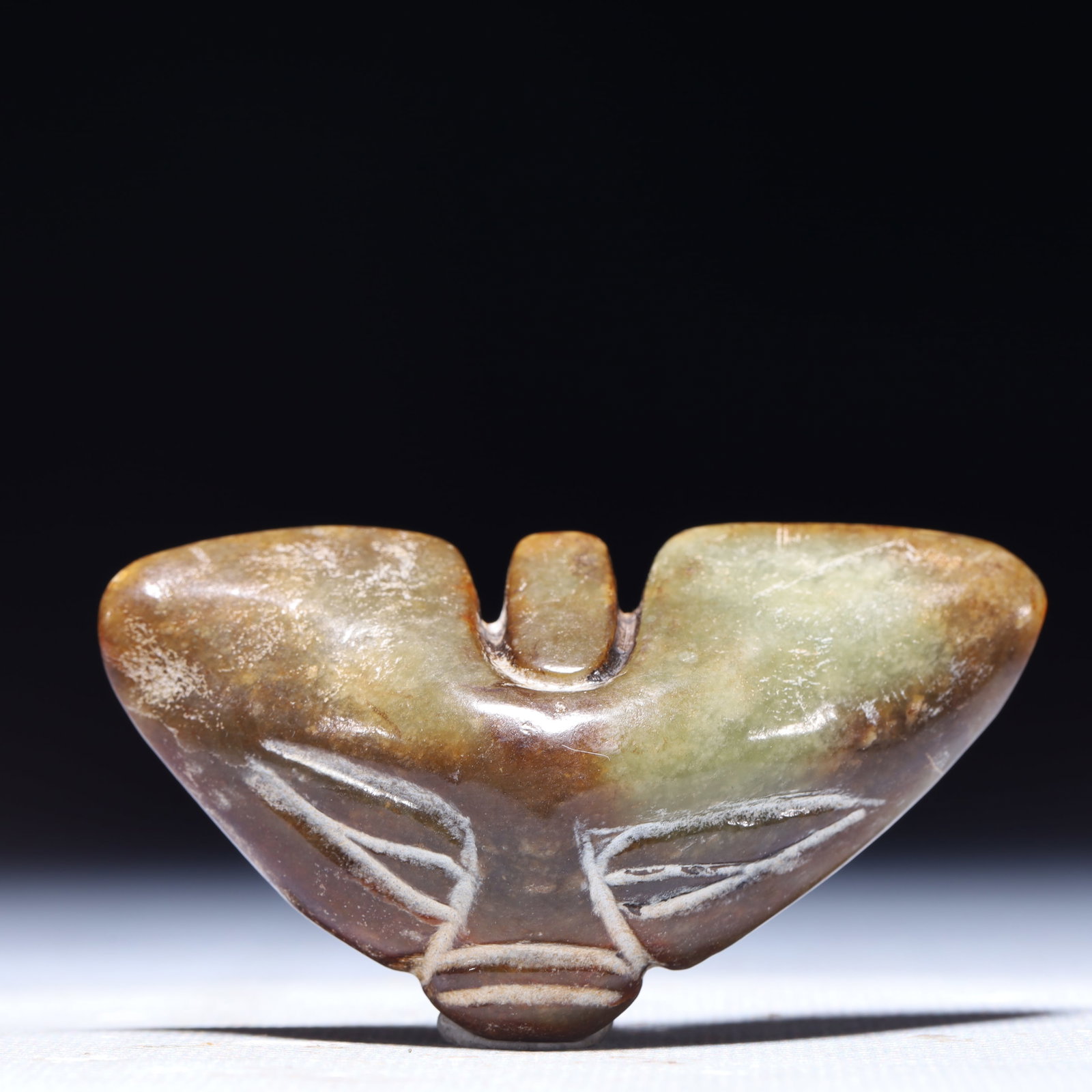 An Archaic Hongshan Culture Greenish Jade Beast-Face Pattern Ornament: An Archaic Hongshan Culture Greenish Jade Beast-Face Pattern Ornament,Ancient Time,China,Size:2.8inx1.2inx0.6in,Weight:53g 红山文化青白玉兽面ń