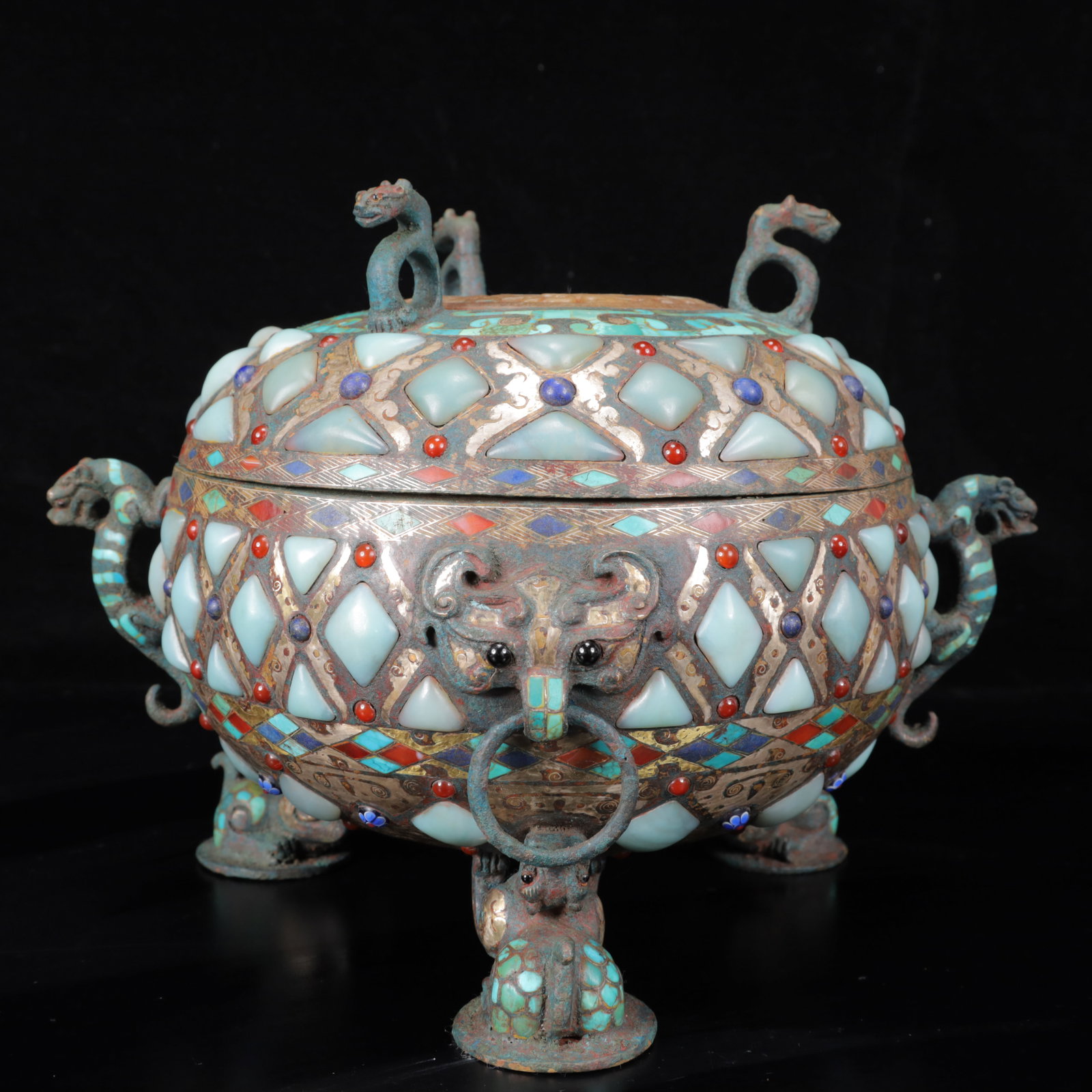 An Archaic Bronze Inlaid Gold and Silver Elephant-Ears Tripod Censer,Inlaid Gems: An Archaic Bronze Inlaid Gold and Silver Elephant-Ears Tripod Censer,Inlaid Gems,The Warring States period in China,Size:11.4inx8.7inx8.5in,Weight:3950g 铜错金银象耳