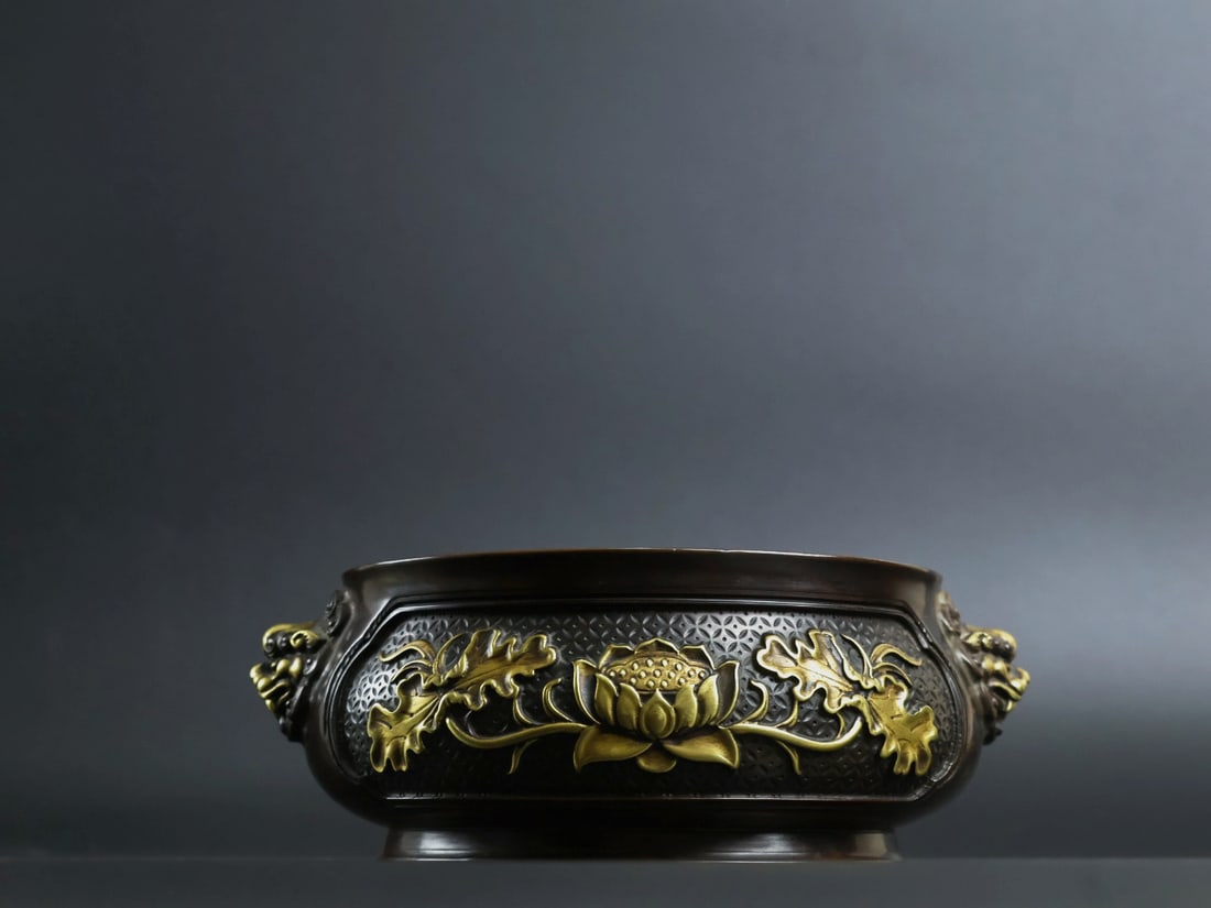 An Exquisite Gilt Bronze Lotus Pattern Beast-Ears Censer: An Exquisite Gilt Bronze Lotus Pattern Beast-Ears Censer,Qing Dynasty, China, With Mark,Size:2.6inx5.5in,Weight:1720g 铜鎏金荷花纹兽耳香炉,&
