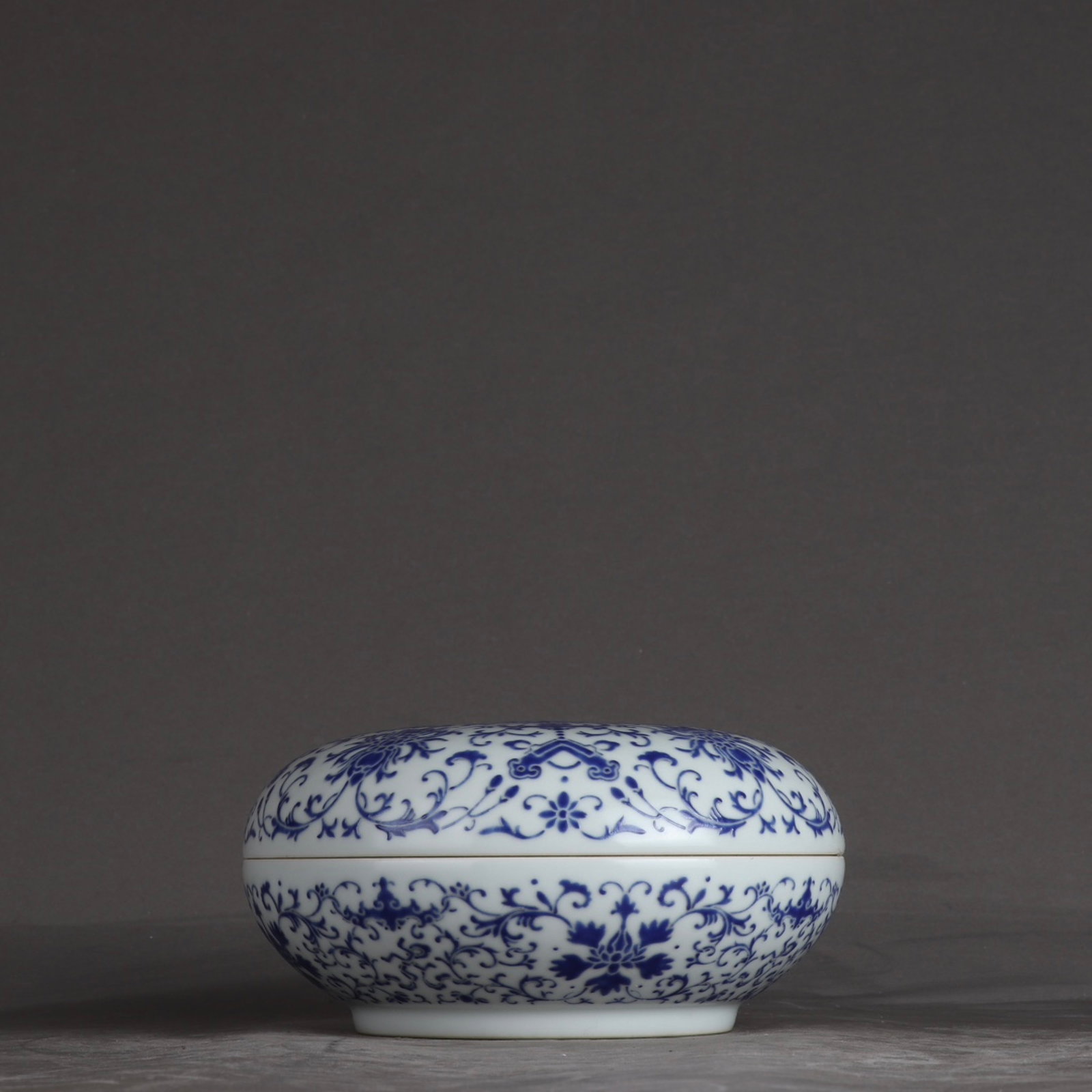 An Exquisite Enamel Lotus Pattern Box: An Exquisite Enamel Lotus Pattern Box,Qing Dynasty,China,Qianlong Six-character Mark,Size:3.3inx6.3in 珐琅彩缠枝莲纹盒,中国清代,