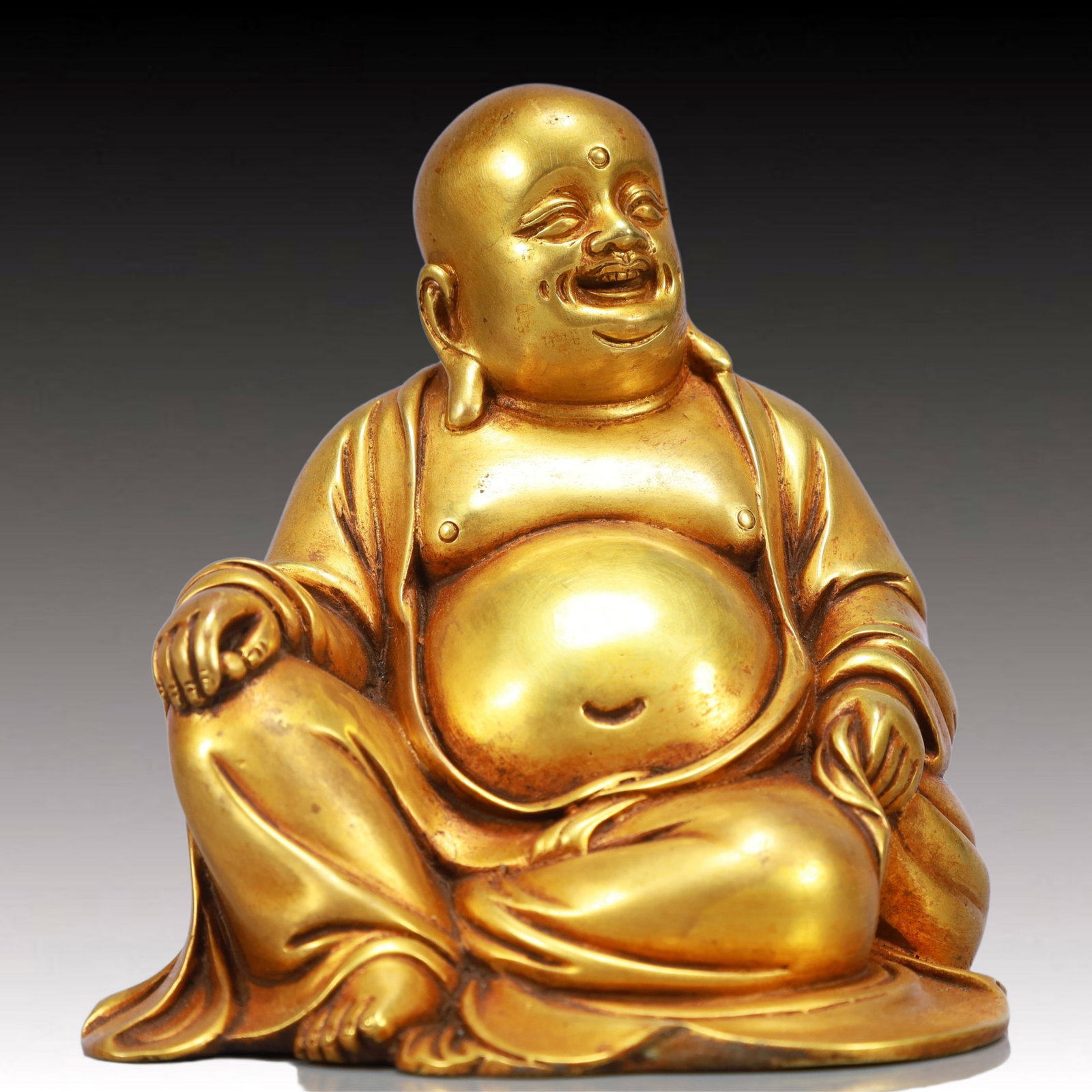 A Solemn Gilt Bronze Statue of Maitreya Buddha: A Solemn Gilt Bronze Statue of Maitreya Buddha,Ming Dynasty, China,Yongle Six-character Mark,Size:5.9inx4.7inx5.5in,Weight:2500g 铜鎏金弥勒佛像,中ࢲ