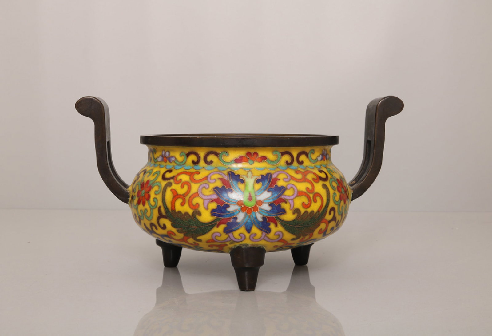 An Exquisite Cloisonne Lotus Pattern Double-Ears and Tripod Censer: An Exquisite Cloisonne Lotus Pattern Double-Ears and Tripod Censer,Qing Dynasty,China,Qianlong Four-Character Mark,Size:5.1inx9.3in,Weight:1742g 景泰蓝缠枝莲纹