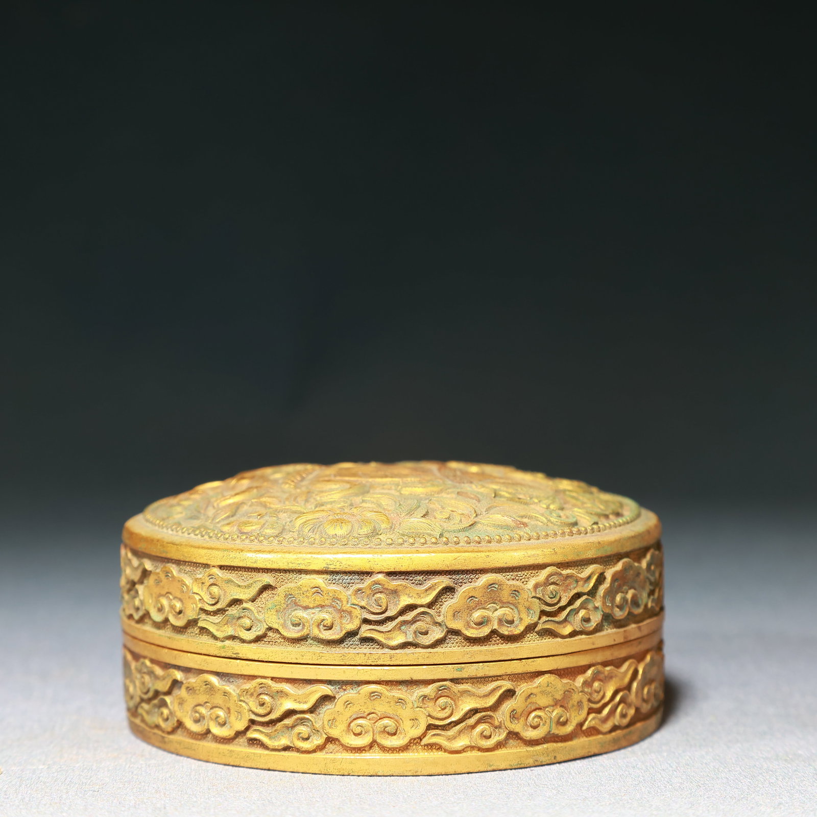 An Exquisite Gilt Bronze Auspicious Cloud and Beast Pattern Box with Cover: An Exquisite Gilt Bronze Auspicious Cloud and Beast Pattern Box with Cover,Qing Dynasty,China,Size:3.3inx1.2in,Weight:450g 铜鎏金祥云兽纹盖盒,