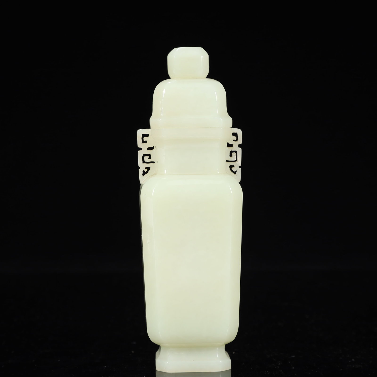 An Exquisite White Jade Double-Ears Bottle: An Exquisite White Jade Double-Ears Bottle,Qing Dynasty, China,Size:2.2inx1.8inx6.7in,Weight:350g 白玉双耳盖瓶,中国清代